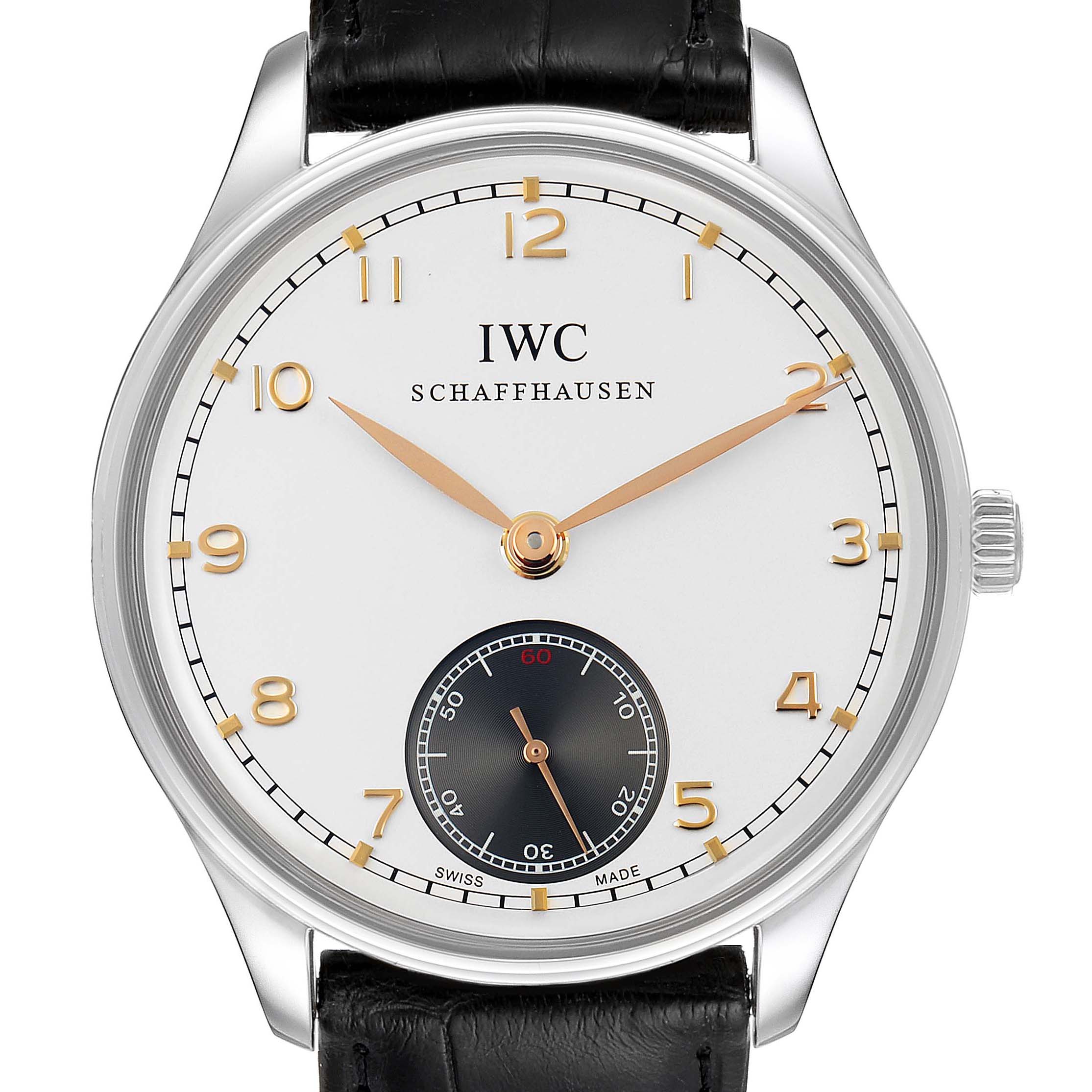 The IWC Portuguese IW545405 Men's Stainless Steel Silver Dial IW545405 Men's Stainless Steel Silver Dial watch is shown from the front, displaying its face, hands, dial, and part of the leather strap and crown.