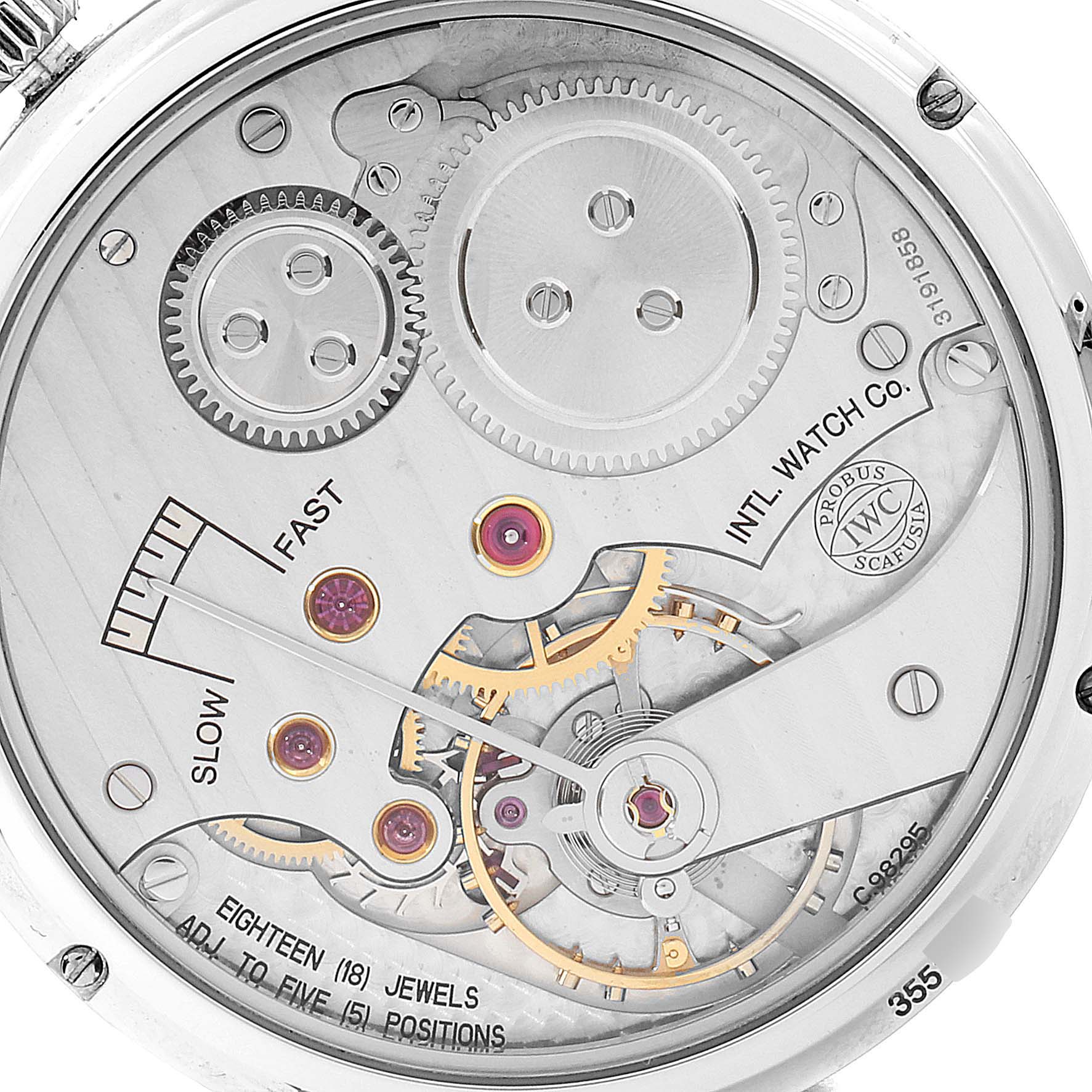 This image shows the movement of an IWC Portuguese IW545405 Men's Stainless Steel Silver Dial IW545405 Men's Stainless Steel Silver Dial watch, displaying gears, jewels, and the IWC engraving.