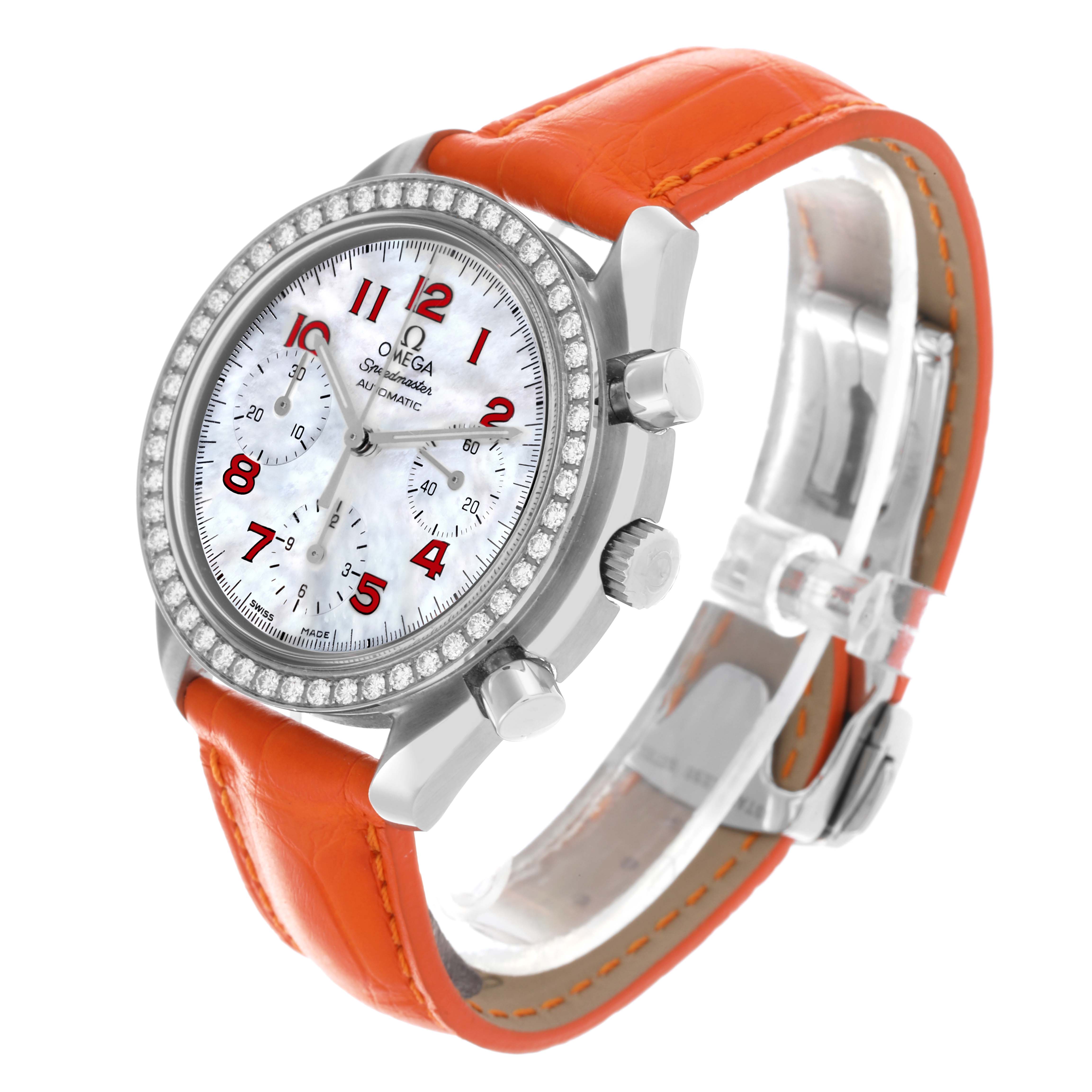 The Omega 3815.79.40 Women's Stainless Steel Mother of Pearl Dial 3815.79.40 Women's Stainless Steel Mother of Pearl Dial Speedmaster model 3815.79.40 watch is angled to show the face, case, diamond bezel, and orange strap.
