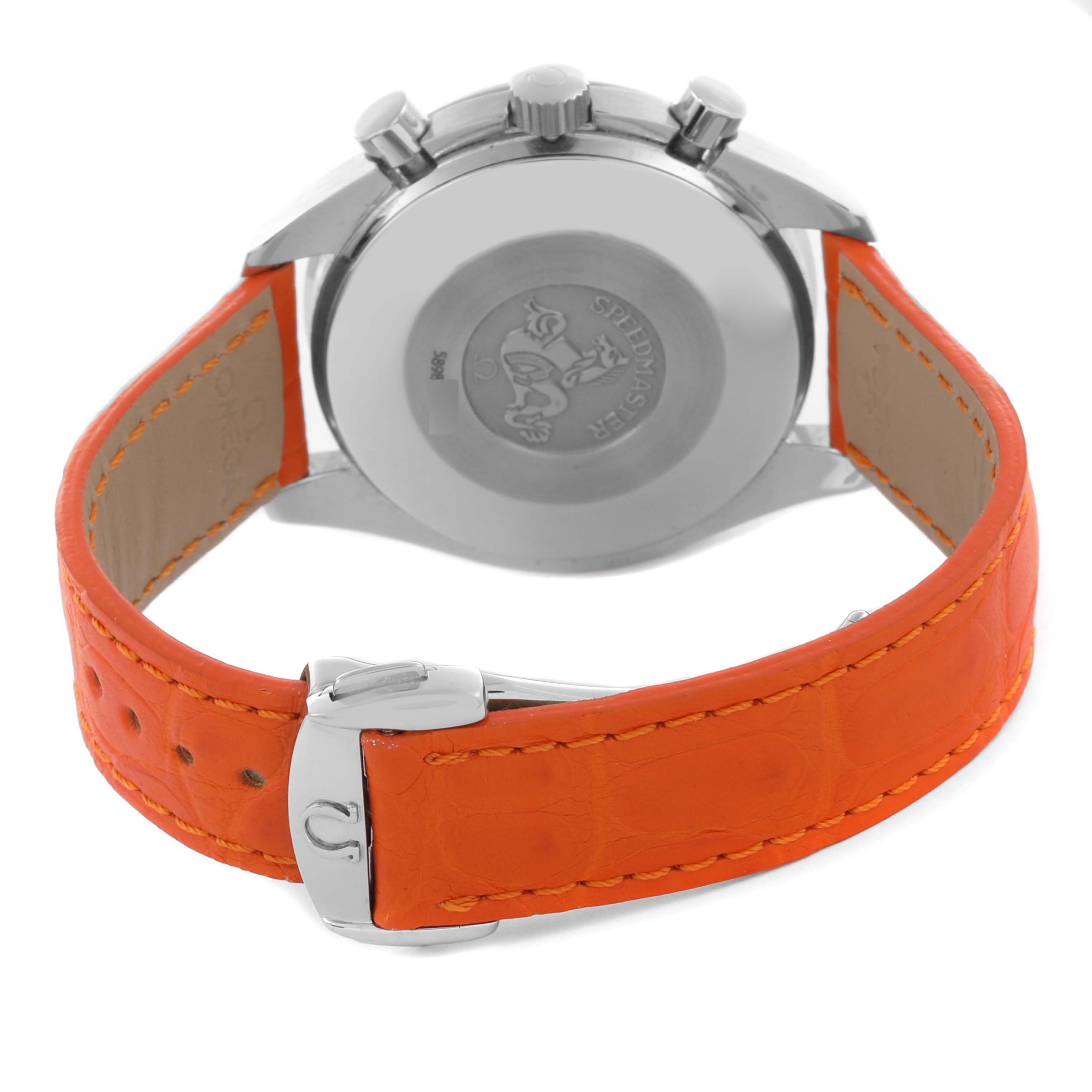 The image shows the back of the Omega 3815.79.40 Women's Stainless Steel Mother of Pearl Dial 3815.79.40 Women's Stainless Steel Mother of Pearl Dial Speedmaster 3815.79.40 watch with an orange strap and visible clasp.