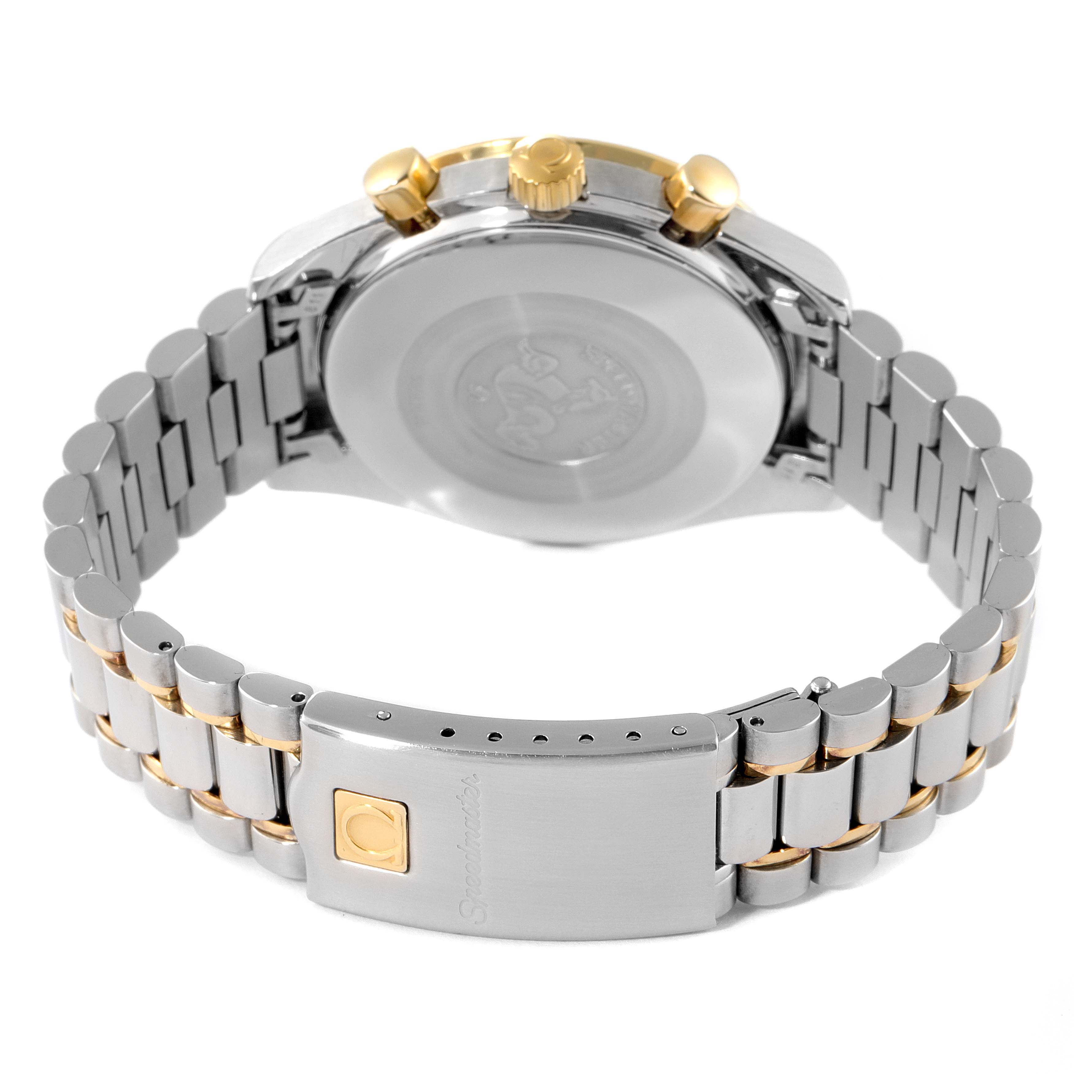 The Omega Speedmaster 3310.20.00 Men's Steel and Gold (two tone) White Dial 3310.20.00 Men's Steel and Gold (two tone) White Dial watch is shown from a rear angle, highlighting the bracelet, case back, and gold-accented crown.