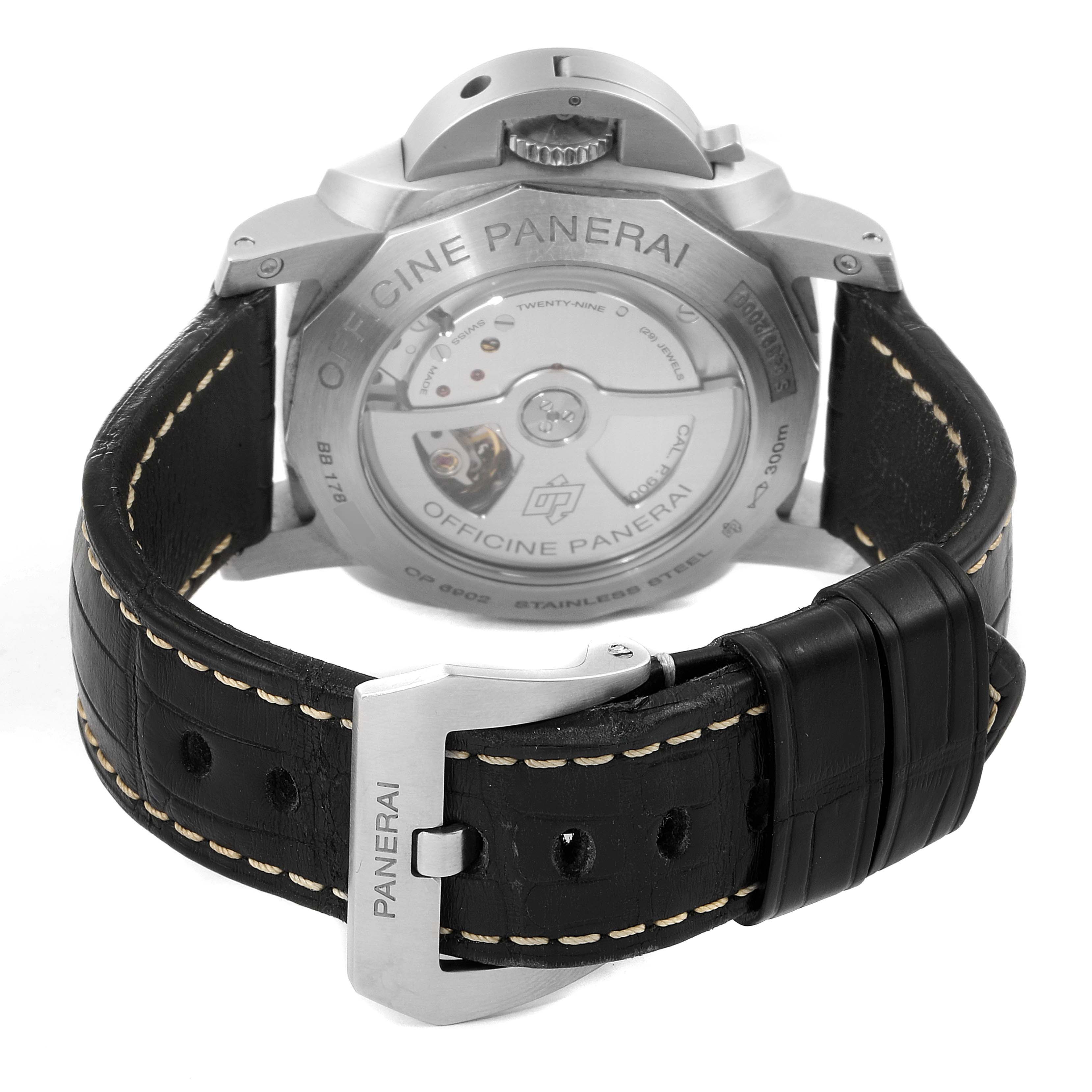 The image shows the back of a Panerai Luminor PAM00321 Men
s Stainless Steel Black Dial PAM00321 Men
s Stainless Steel Black Dial watch, highlighting the case back, mechanism, and black leather strap.