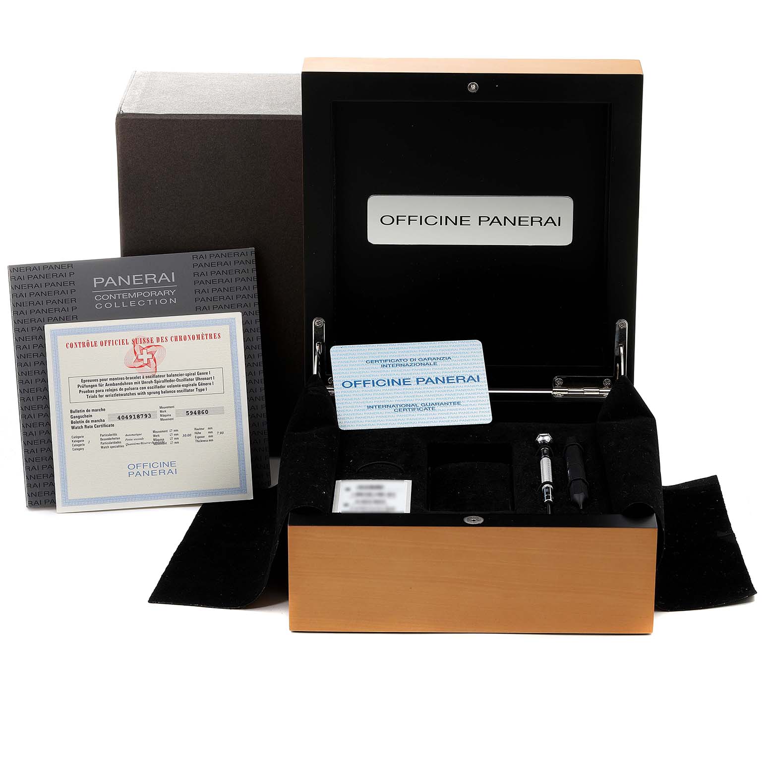 The image shows the open box packaging and documentation for a Panerai Luminor PAM00090 Men
s Stainless Steel Black Dial PAM00090 Men
s Stainless Steel Black Dial watch.