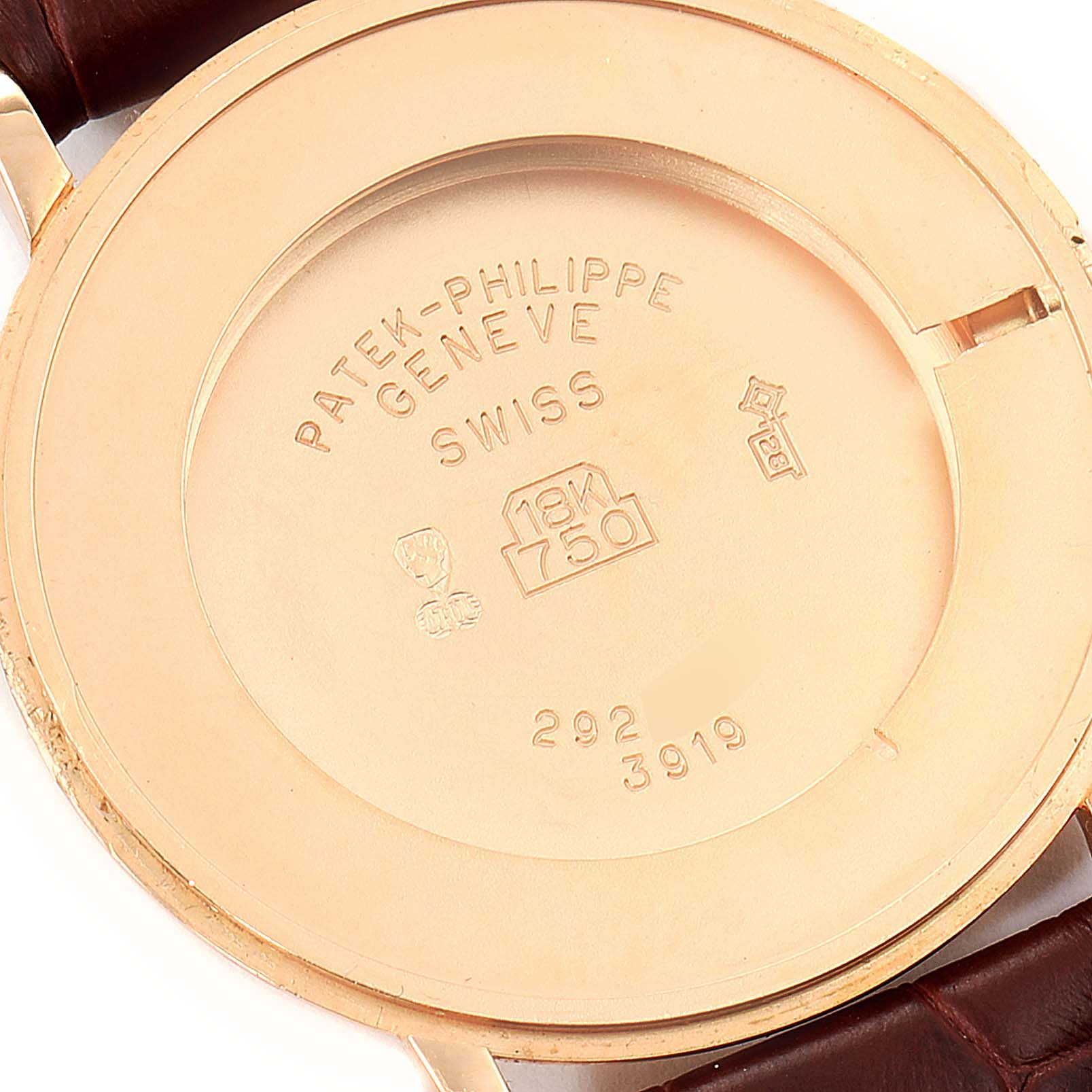 This image shows the back casing of a Patek Philippe Calatrava 3919R Men
s Rose Gold White Dial 3919R Men
s Rose Gold White Dial watch, highlighting its markings and engravings.