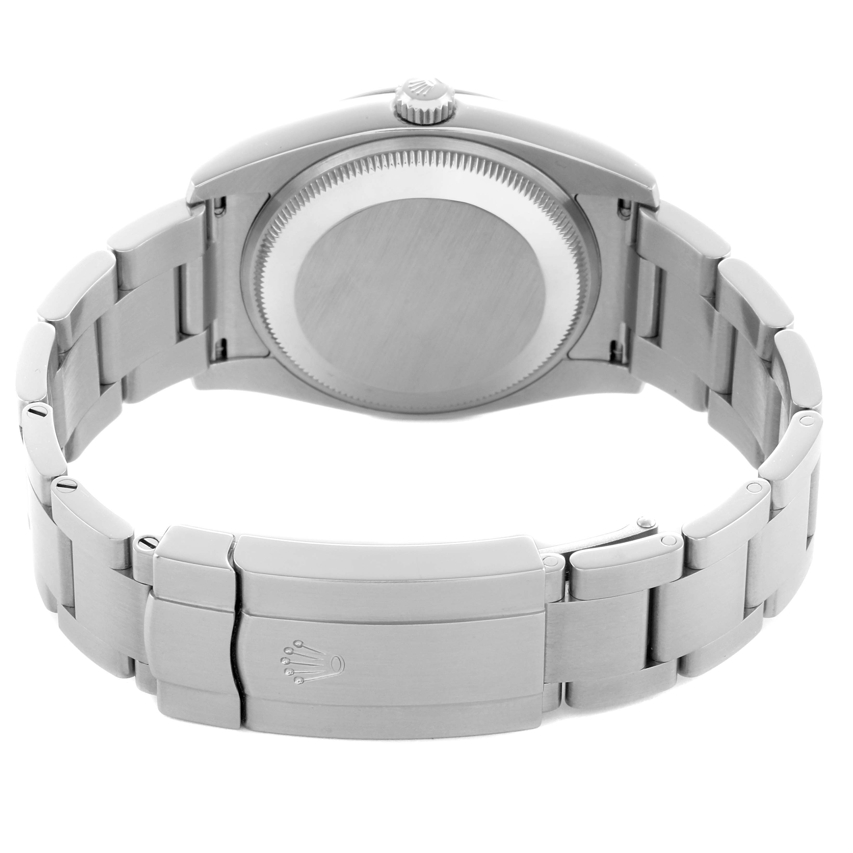 The Rolex Air-King 114200 Men's Stainless Steel White Dial watch is shown from the back, highlighting the case back and bracelet clasp.
