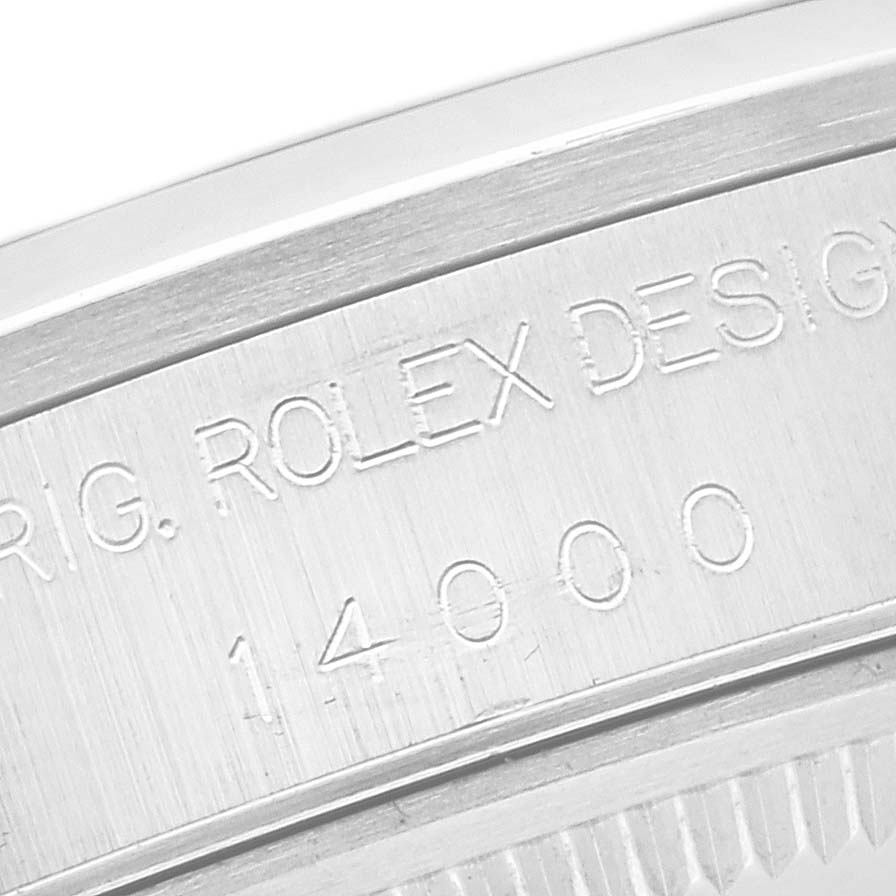 The image shows a close-up of the engravings on the side of a Rolex Air-King 14000 Men's Stainless Steel Black Dial 14000 Men's Stainless Steel Black Dial watch casing.