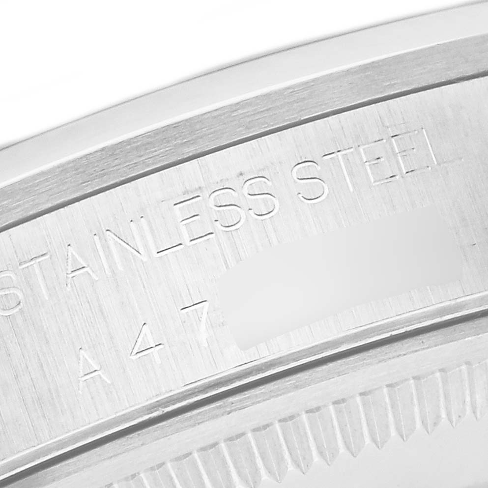 The image shows a close-up of the stainless steel case back of the Rolex Air-King 14000 Men's Stainless Steel Black Dial 14000 Men's Stainless Steel Black Dial watch.