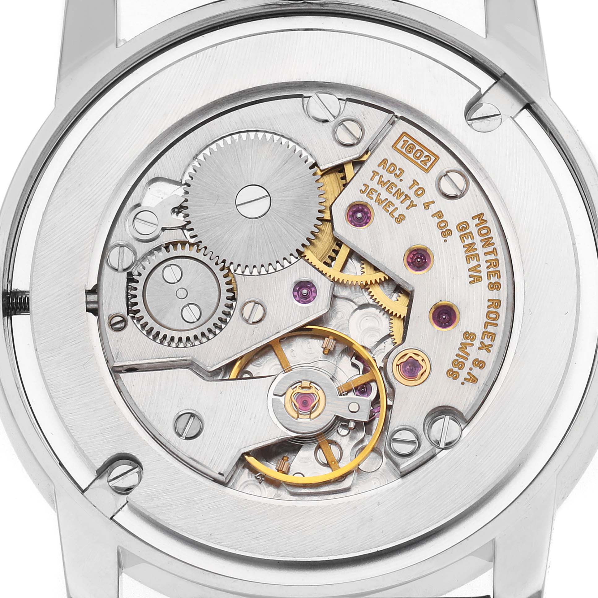 The watch is a Rolex Cellini 5116/9 Men's White Gold White Dial shown from the back, displaying its mechanical movement and intricate gears.