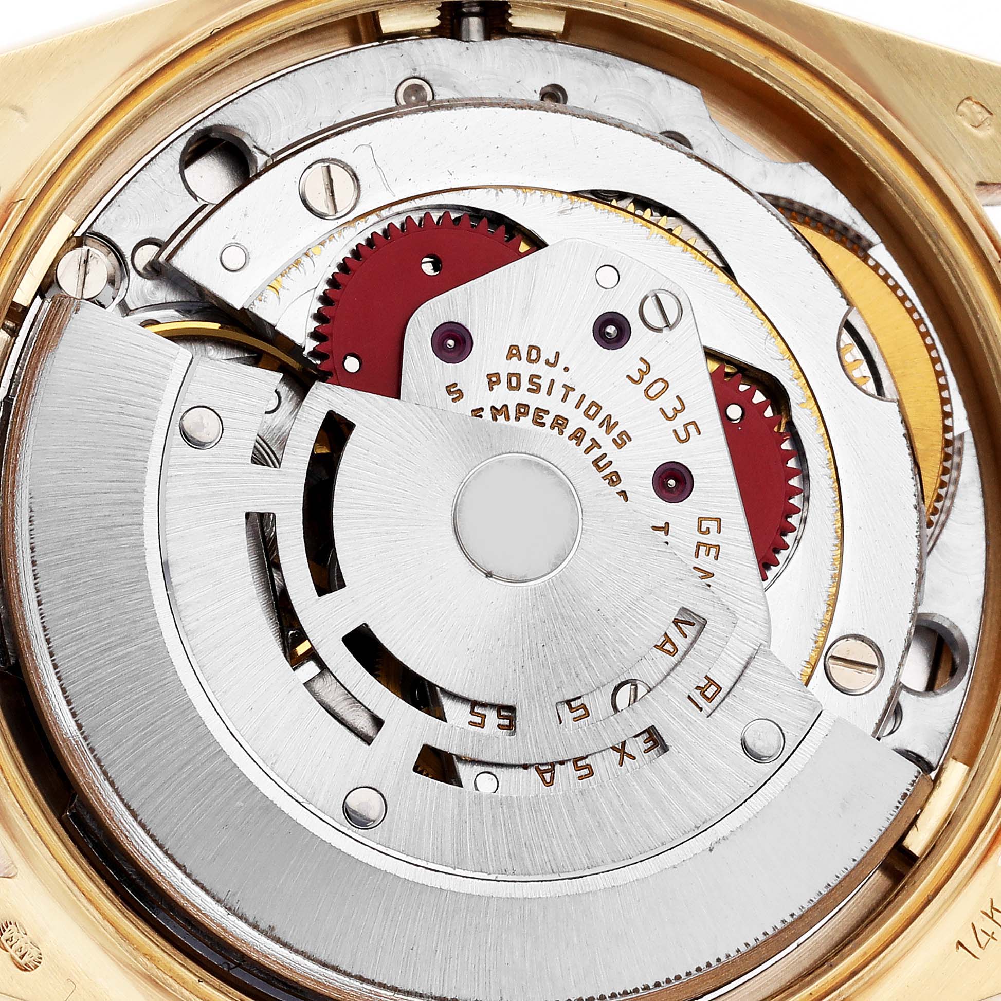 The image shows the movement of a Rolex Date 15037 Men's Yellow Gold White Dial 15037 Men's Yellow Gold White Dial model, focusing on the rotor and intricate mechanical components.