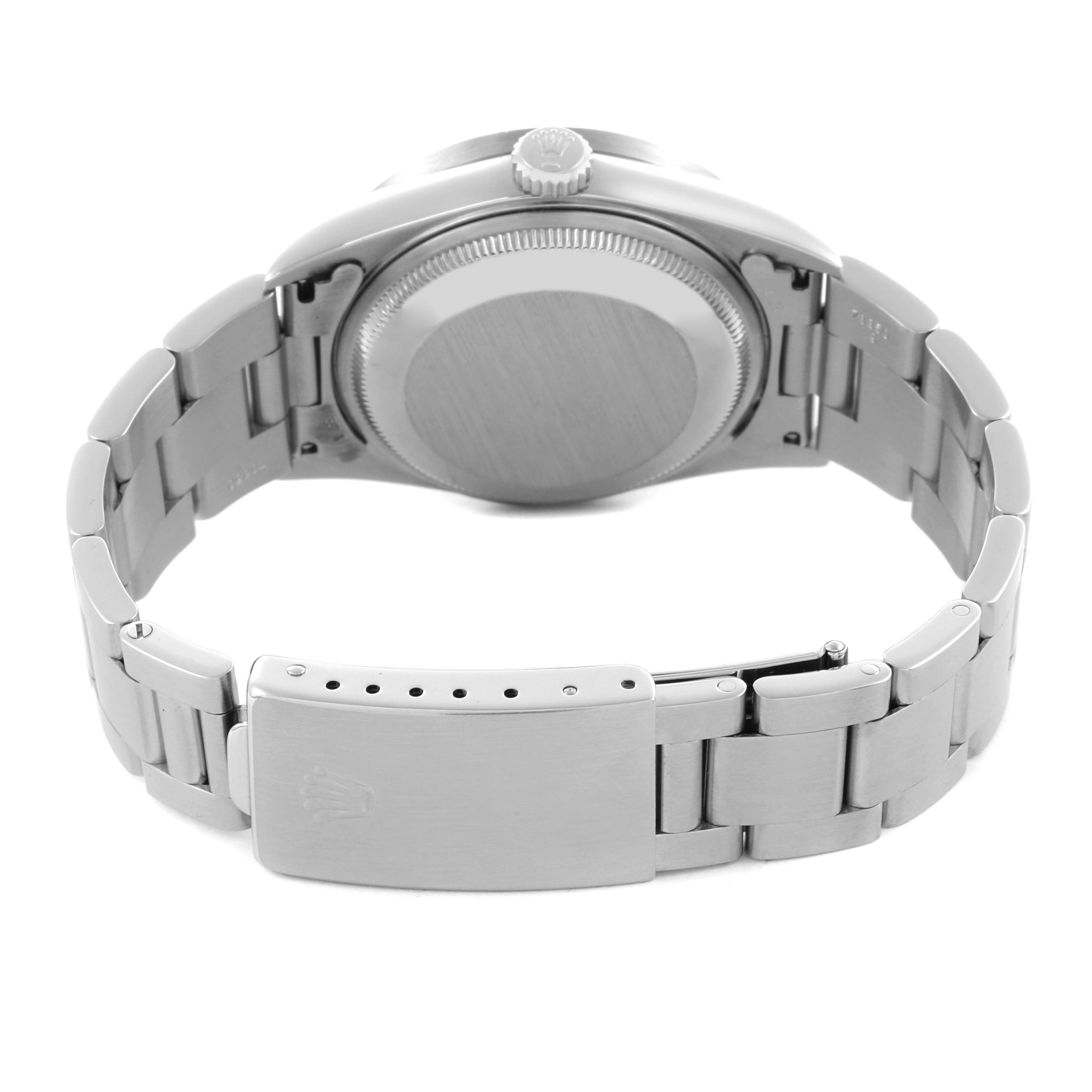 The Rolex Date 15210 Men
s Stainless Steel White Dial 15210 Men
s Stainless Steel White Dial model is shown from the back, highlighting the clasp and bracelet.