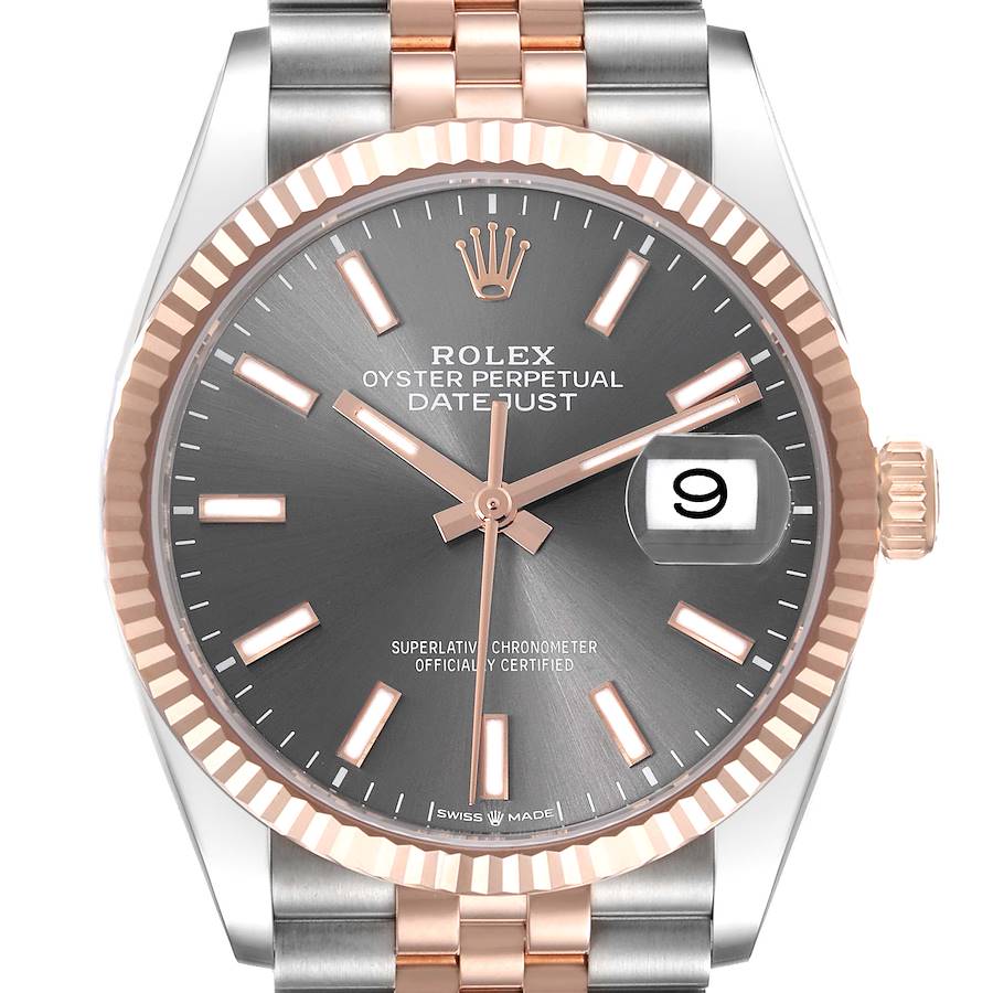 The Rolex Datejust watch is shown from a front angle, highlighting the dial, bezel, crown, and part of the bracelet.