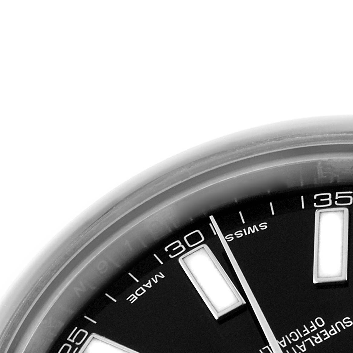 The image shows a close-up of the black dial, markers, and partial bezel of a Rolex Datejust 41 116300 Men's Stainless Steel Black Dial watch.