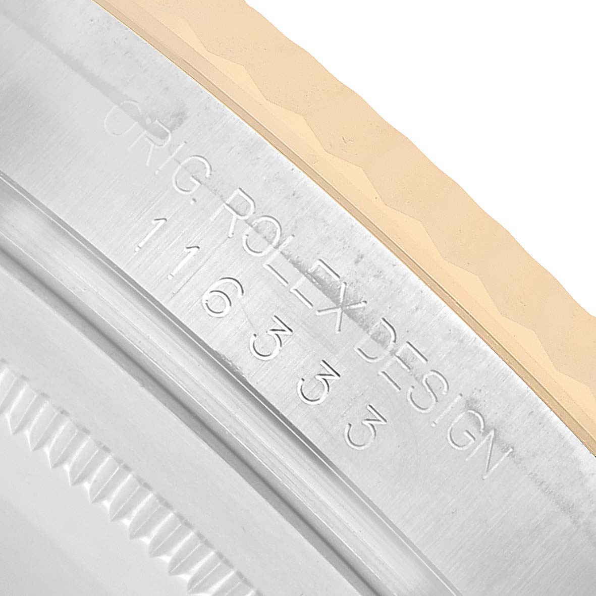 The image shows a close-up of the side engraving on a Rolex Datejust 41 116333 Men's Steel and Gold (two tone) Silver Dial, highlighting the model number.