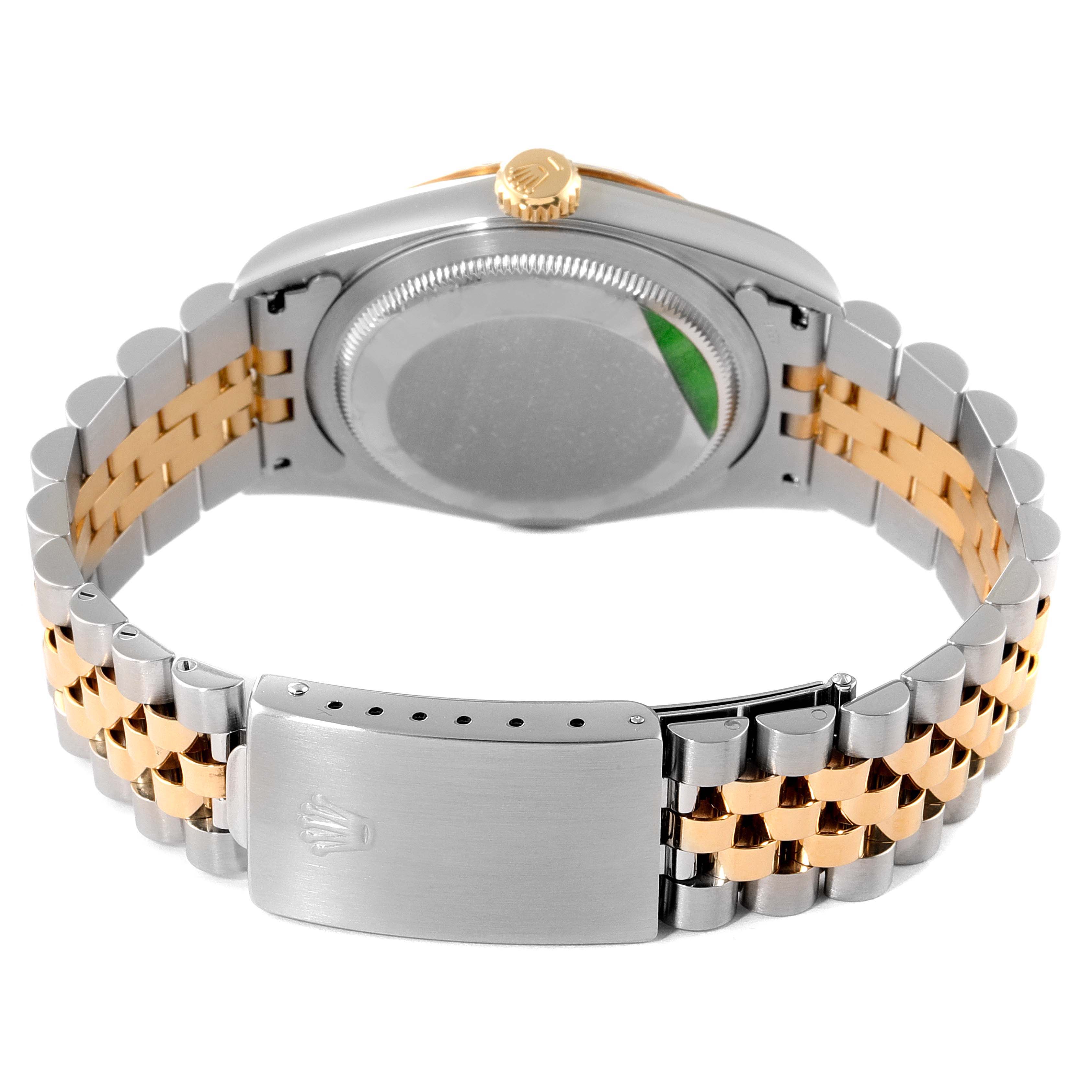 The angle shows the back case and bracelet clasp of the Rolex Datejust 16233 Men's Steel and Gold (two tone) Mother of Pearl Dial 16233 Men's Steel and Gold (two tone) Mother of Pearl Dial watch, highlighting its two-tone metal design.