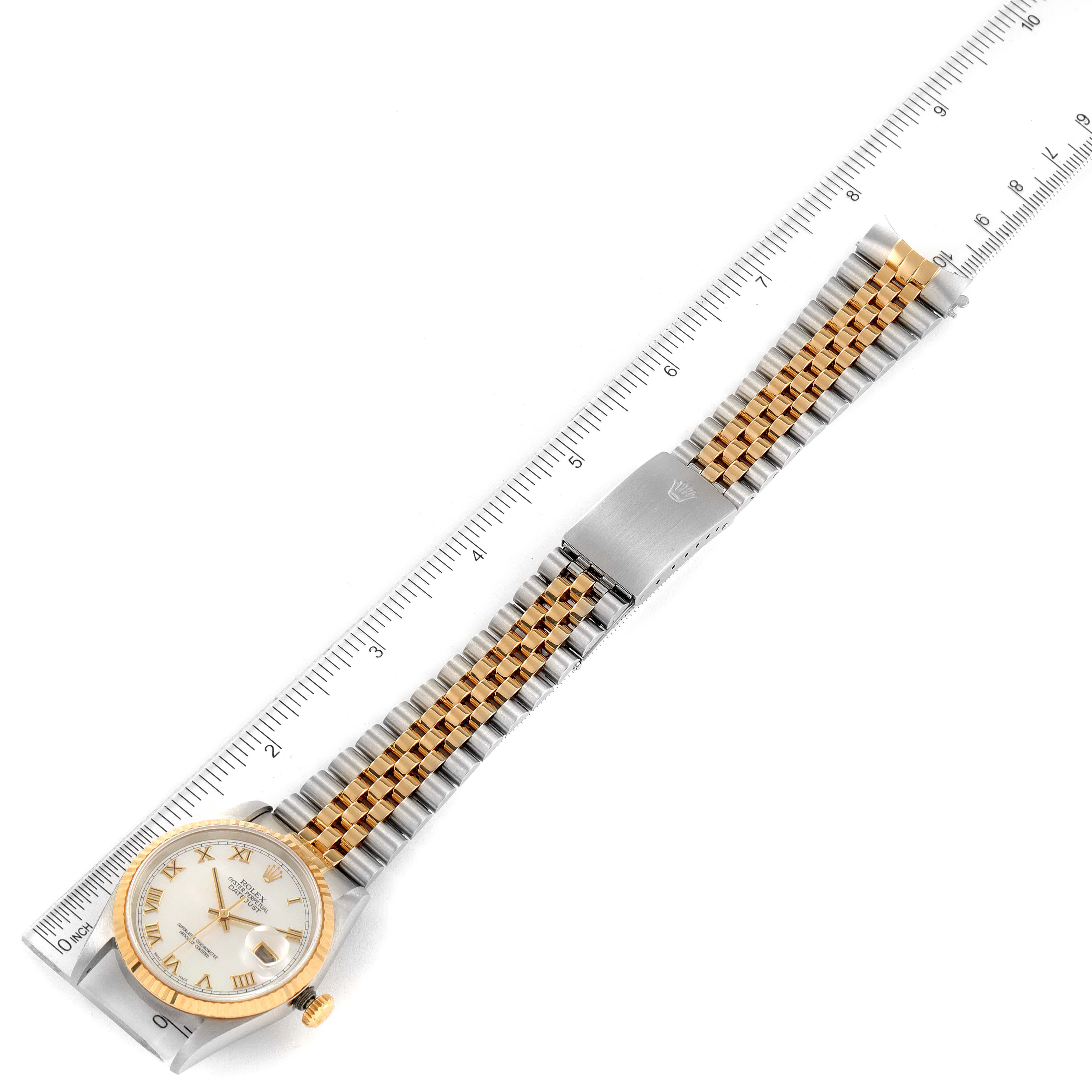 The Rolex Datejust 16233 Men's Steel and Gold (two tone) Mother of Pearl Dial 16233 Men's Steel and Gold (two tone) Mother of Pearl Dial watch is shown from an overhead view, featuring the case, dial, and the full length of the bracelet.
