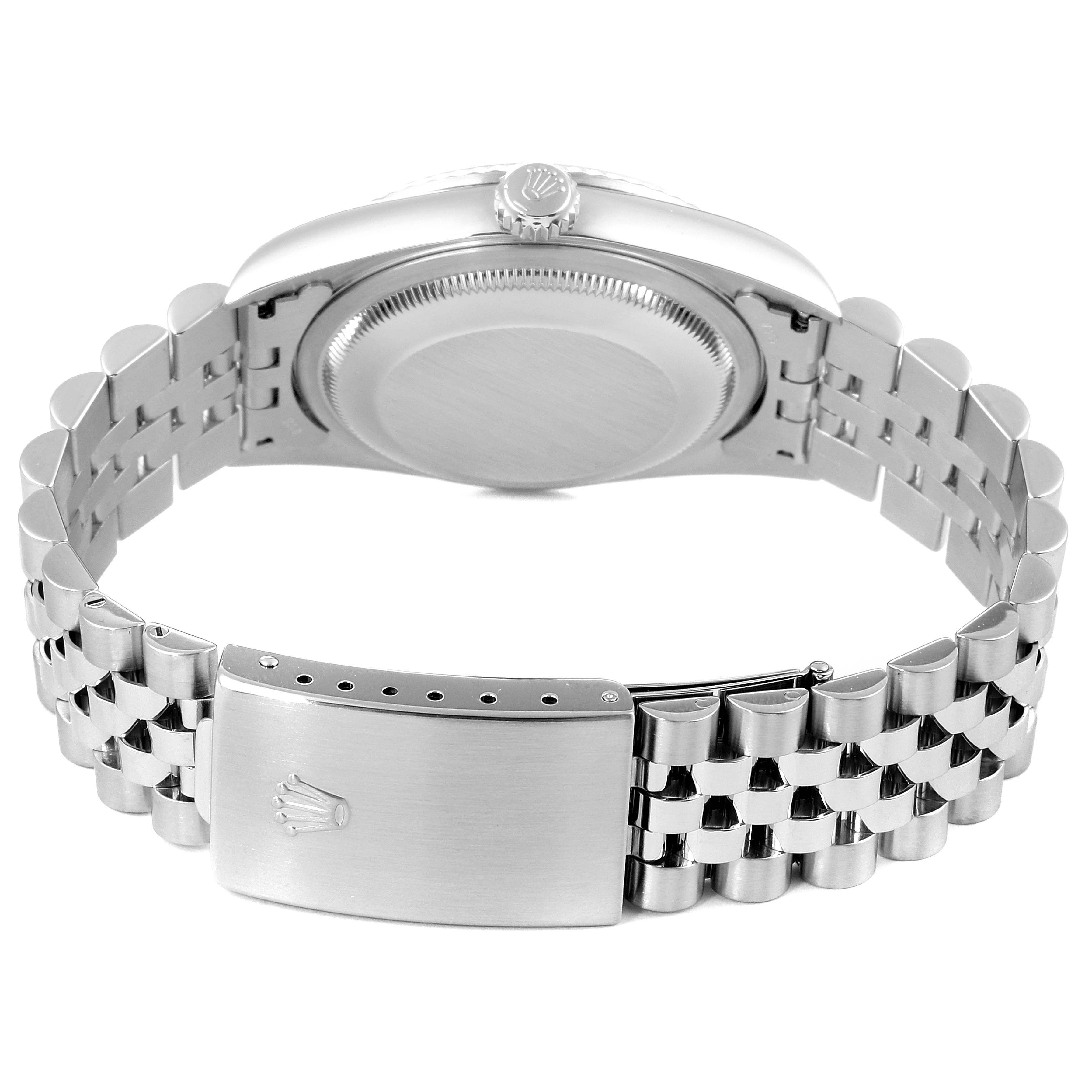 This image shows the back view of a Rolex Datejust 16234 Men's Stainless Steel Silver Dial 16234 Men's Stainless Steel Silver Dial watch, including the case back and the Jubilee bracelet with the clasp.