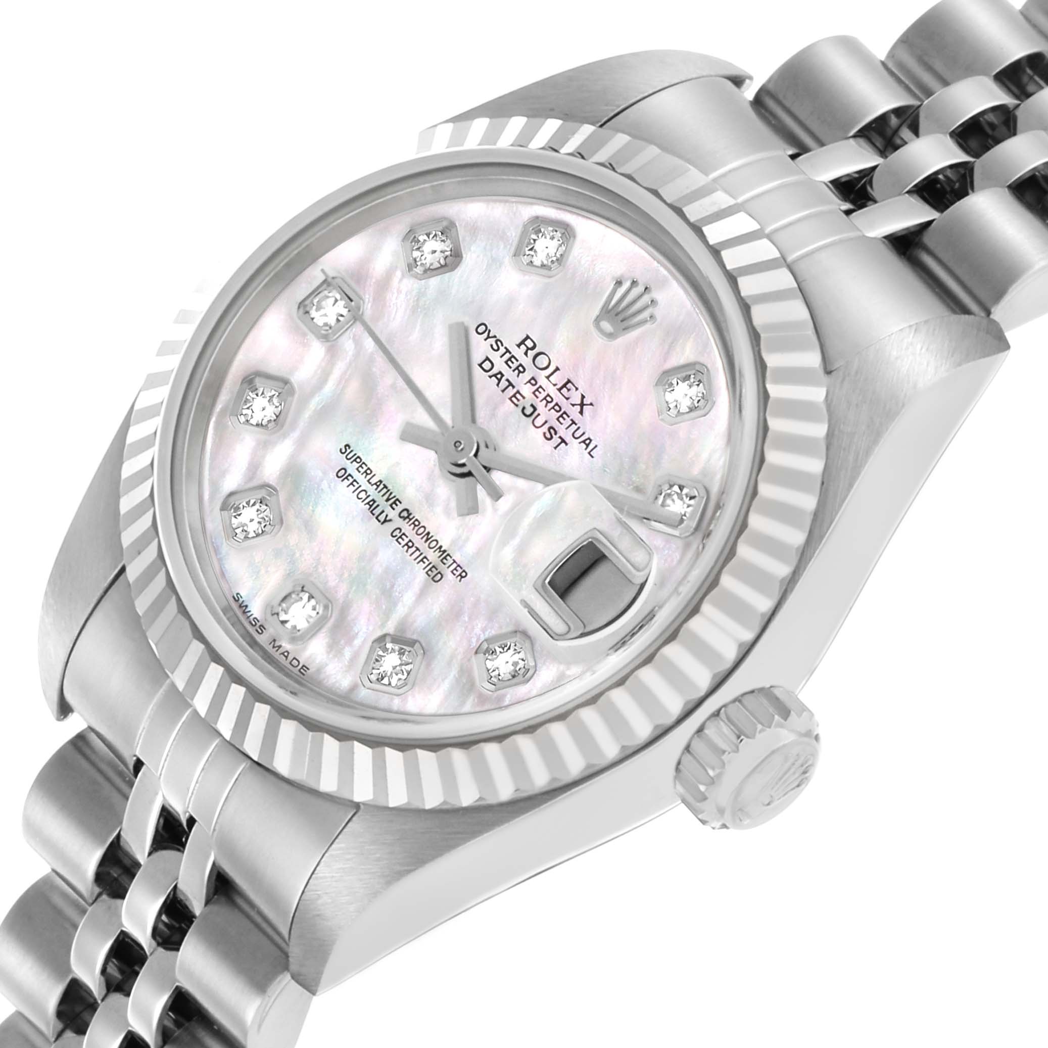 This Rolex Datejust 79174 Women's Stainless Steel Mother of Pearl Dial watch is shown at an angled view, displaying the face, fluted bezel, crown, and part of the bracelet.