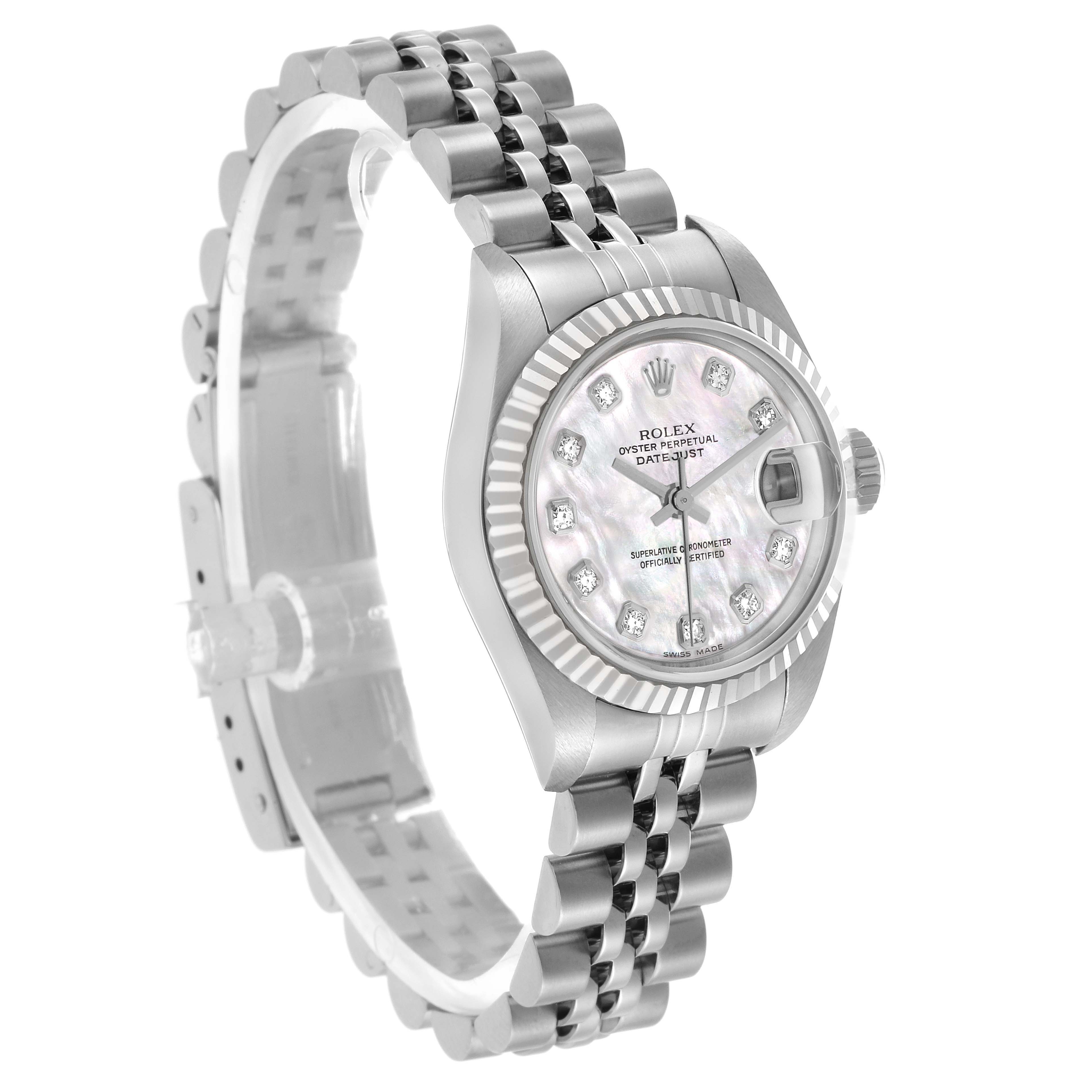 The Rolex Datejust 79174 Women's Stainless Steel Mother of Pearl Dial watch is shown at a three-quarter angle, highlighting the dial, bezel, case, and Jubilee bracelet.