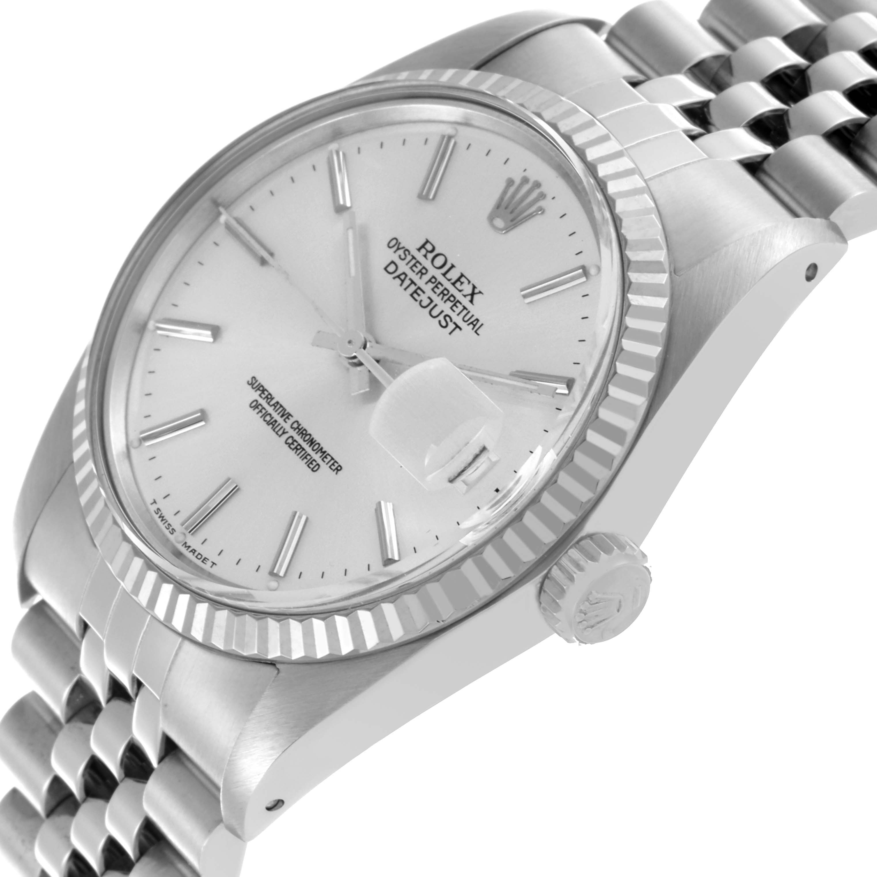 The Rolex Datejust 16014 Men's Stainless Steel Silver Dial 16014 Men's Stainless Steel Silver Dial watch is shown at a tilted angle, highlighting the face, bezel, crown, and bracelet.