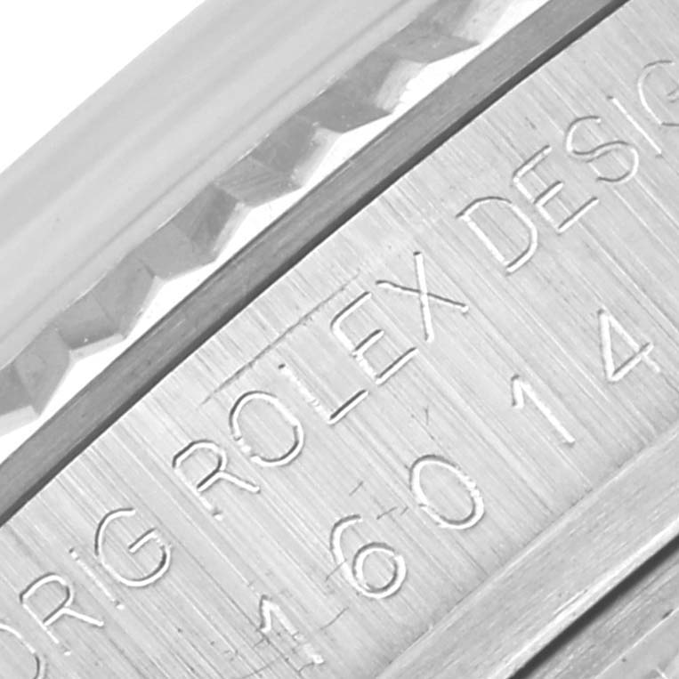 The image shows a close-up of the engraved side of a Rolex Datejust 16014 Men's Stainless Steel Silver Dial 16014 Men's Stainless Steel Silver Dial case, highlighting the model details.