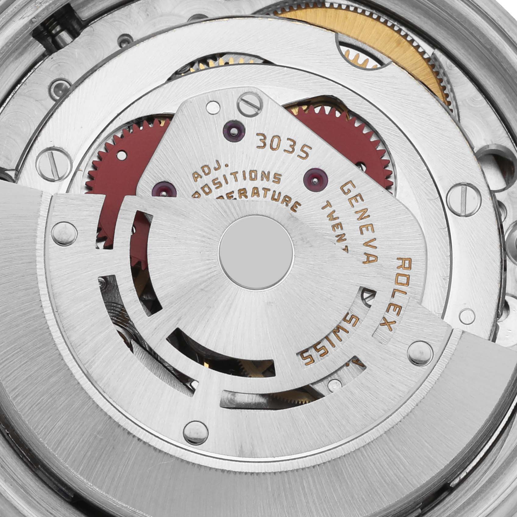 The image shows an internal view of the Rolex Datejust 16014 Men's Stainless Steel Silver Dial 16014 Men's Stainless Steel Silver Dial watch movement, highlighting gears and mechanical components.