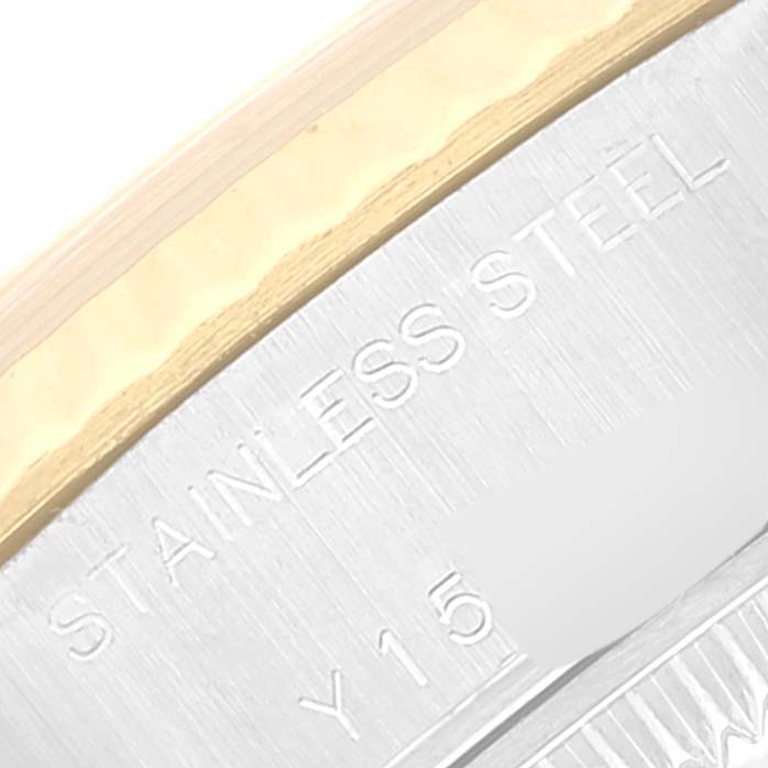 This close-up image shows the inscription "STAINLESS STEEL" on the casing of a Rolex Datejust 79173 Women's Steel and Gold (two tone) Champagne Dial 79173 Women's Steel and Gold (two tone) Champagne Dial watch.