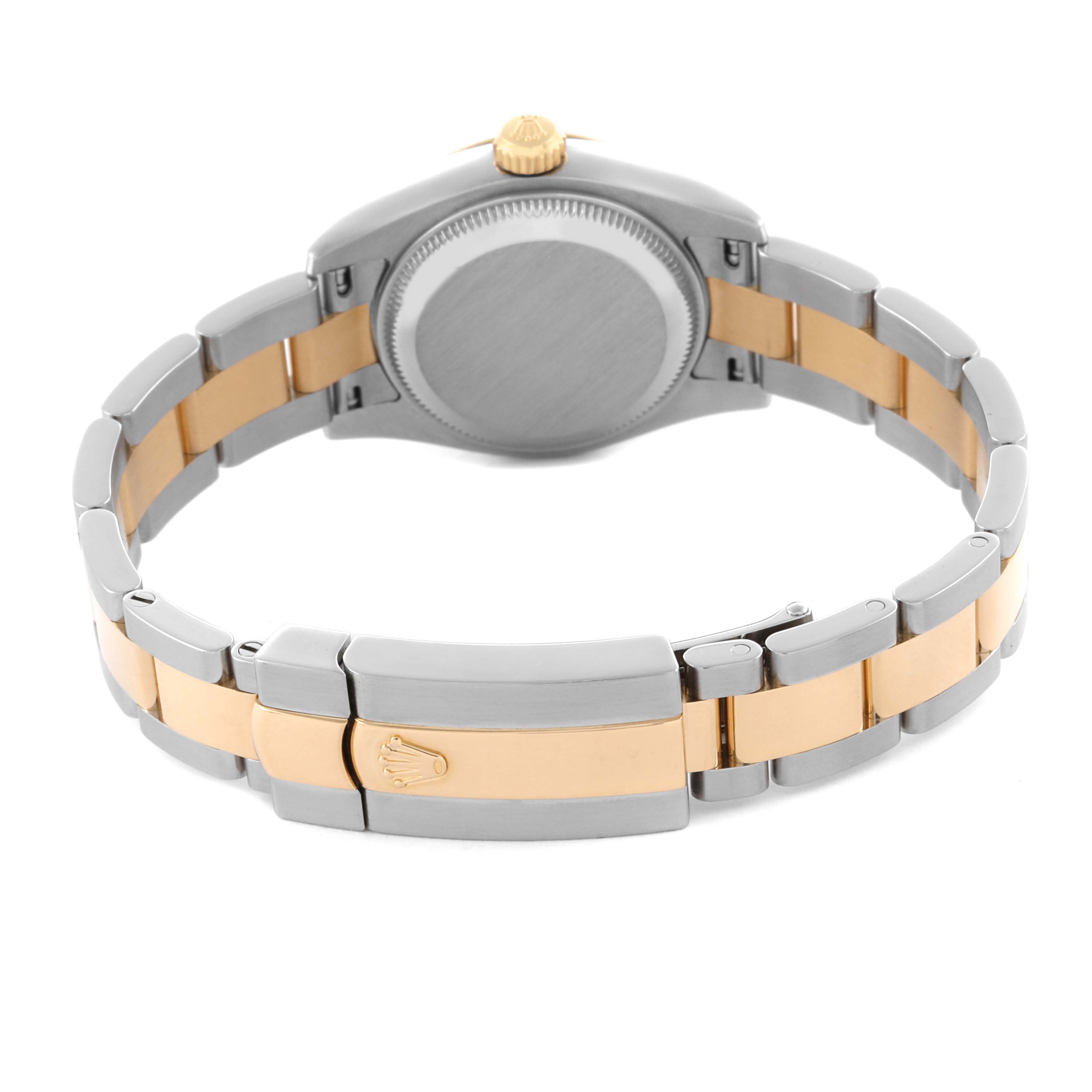 The watch, a Rolex Datejust 179173 Women's Steel and Gold (two tone) White Dial 179173 Women's Steel and Gold (two tone) White Dial model, is shown from the back, highlighting the bracelet and clasp.