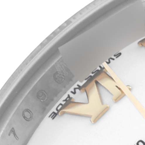 The image shows a close-up of the Rolex Datejust 179173 Women's Steel and Gold (two tone) White Dial 179173 Women's Steel and Gold (two tone) White Dial dial with partial view of the Roman numeral "X" and minute hand.