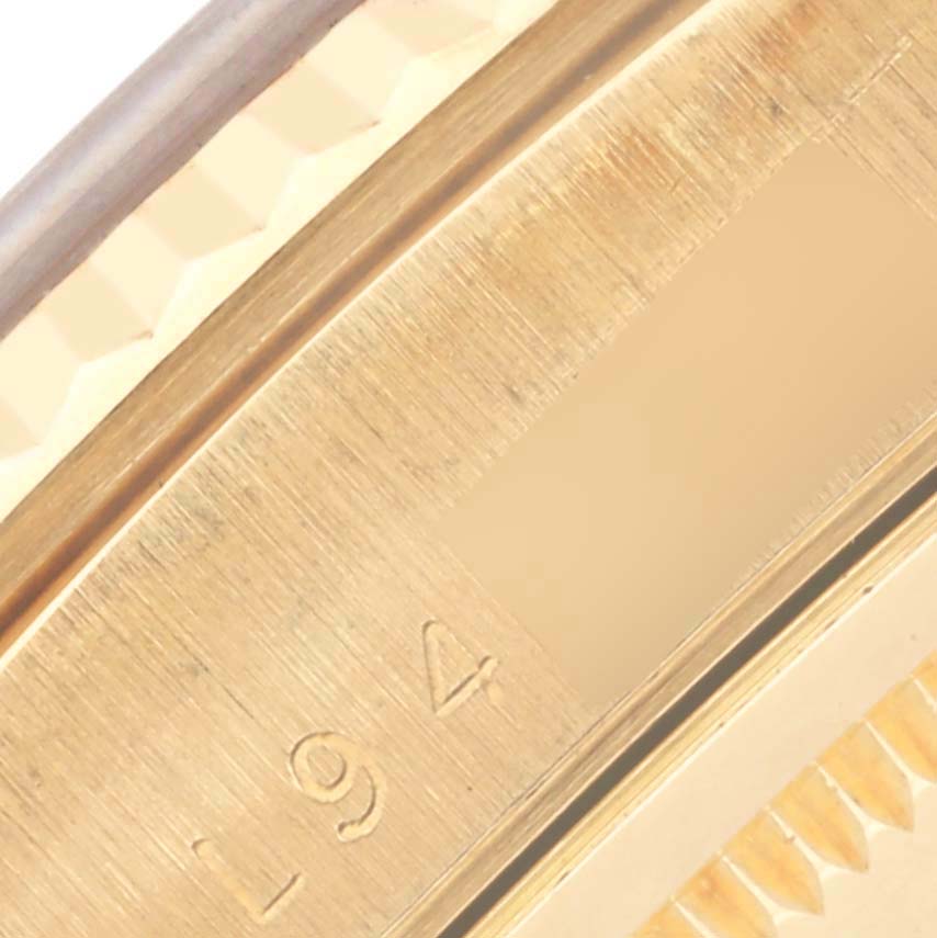 The image shows a close-up of the engraved side of the Rolex President 18238 Men
s Yellow Gold Champagne Dial 18238 Men
s Yellow Gold Champagne Dial model watch, highlighting its detail.