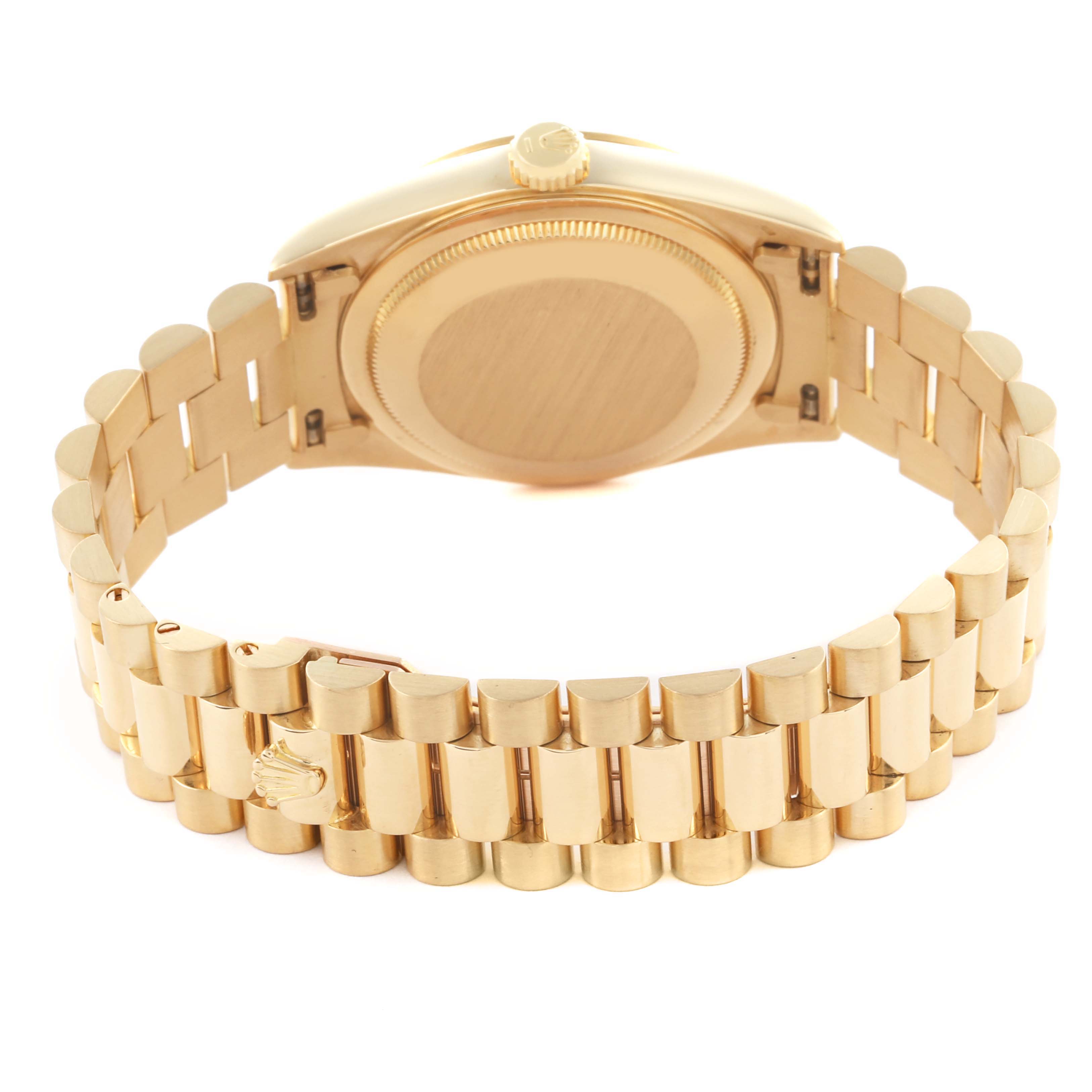 The image shows the back and bracelet of a Rolex President 18238 Men
s Yellow Gold Champagne Dial 18238 Men
s Yellow Gold Champagne Dial model watch, highlighting the case back and gold links.