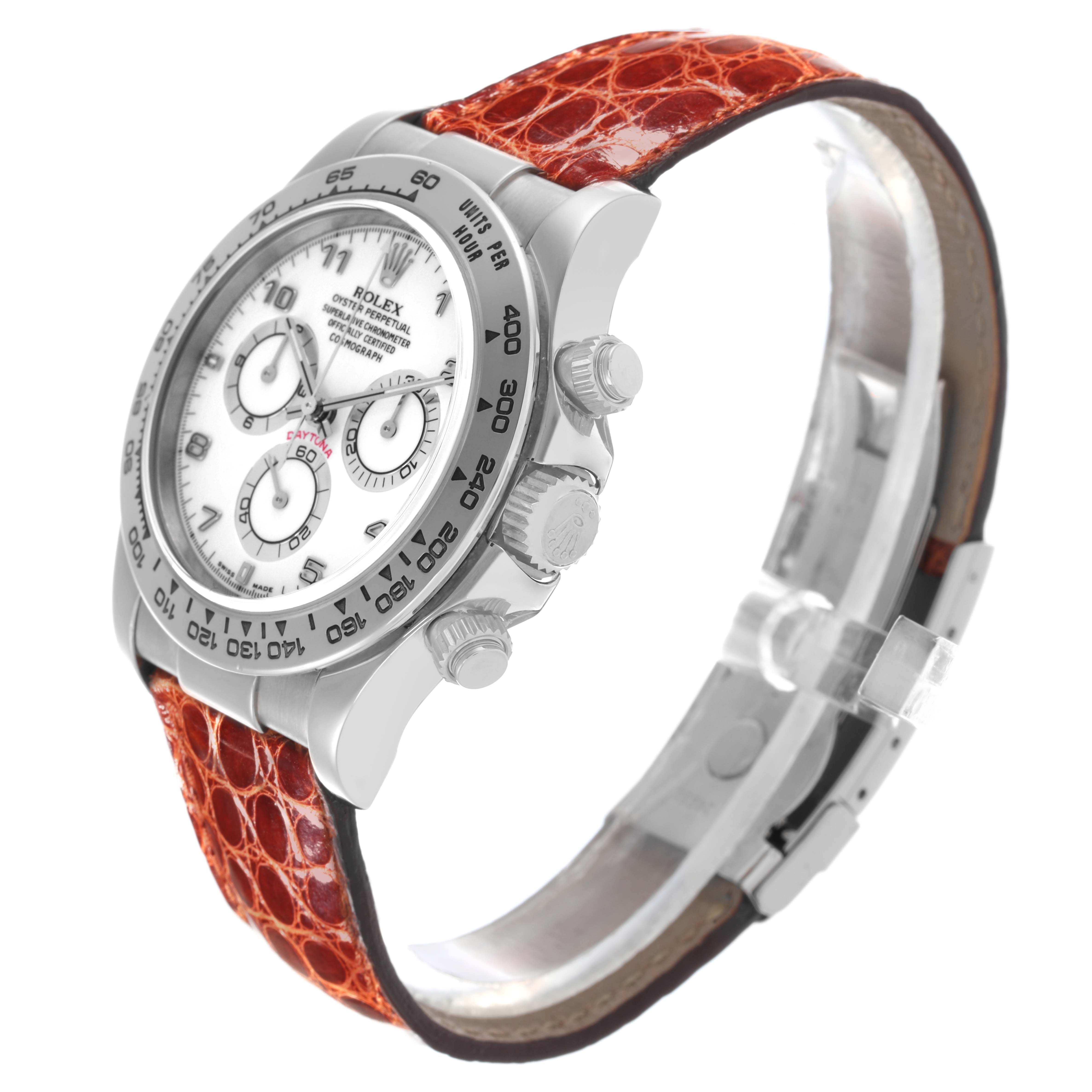 The Rolex Daytona 116519 Men's White Gold White Dial 116519 Men's White Gold White Dial is shown in a side angle, highlighting the case, dial, bezel, and leather strap.