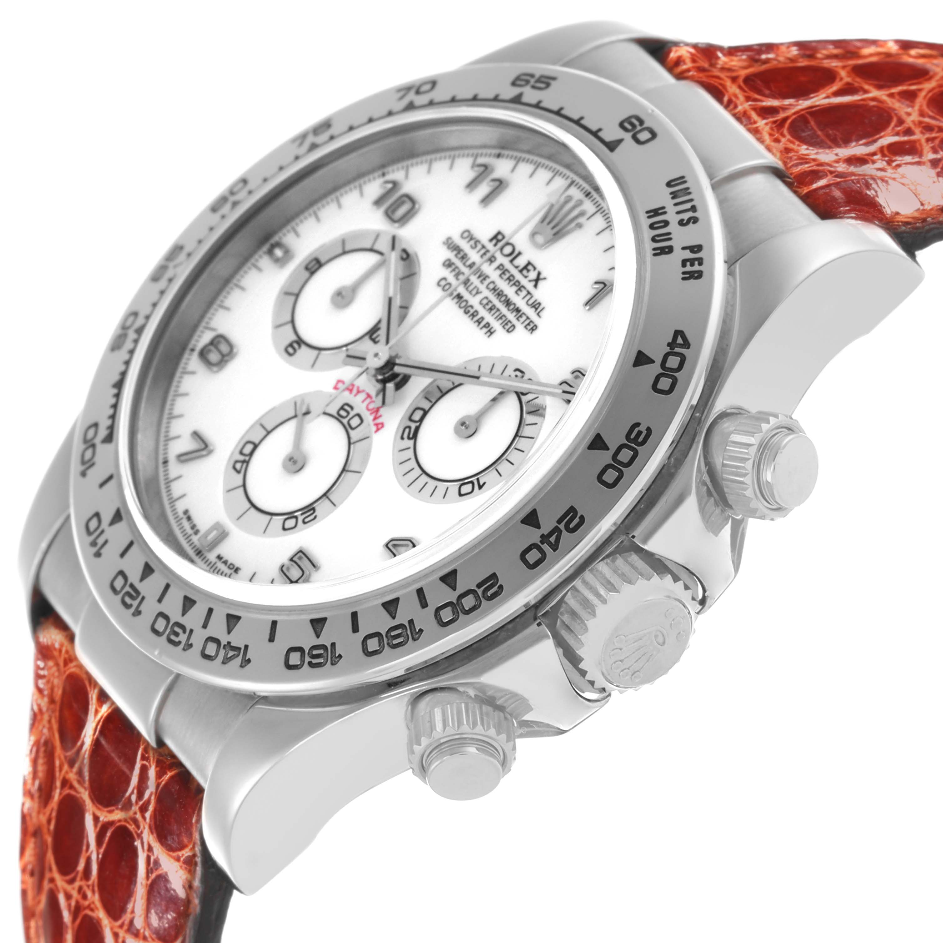 This Rolex Daytona 116519 Men's White Gold White Dial 116519 Men's White Gold White Dial watch is shown at an angled side view, highlighting its bezel, crown, pushers, and part of the strap.
