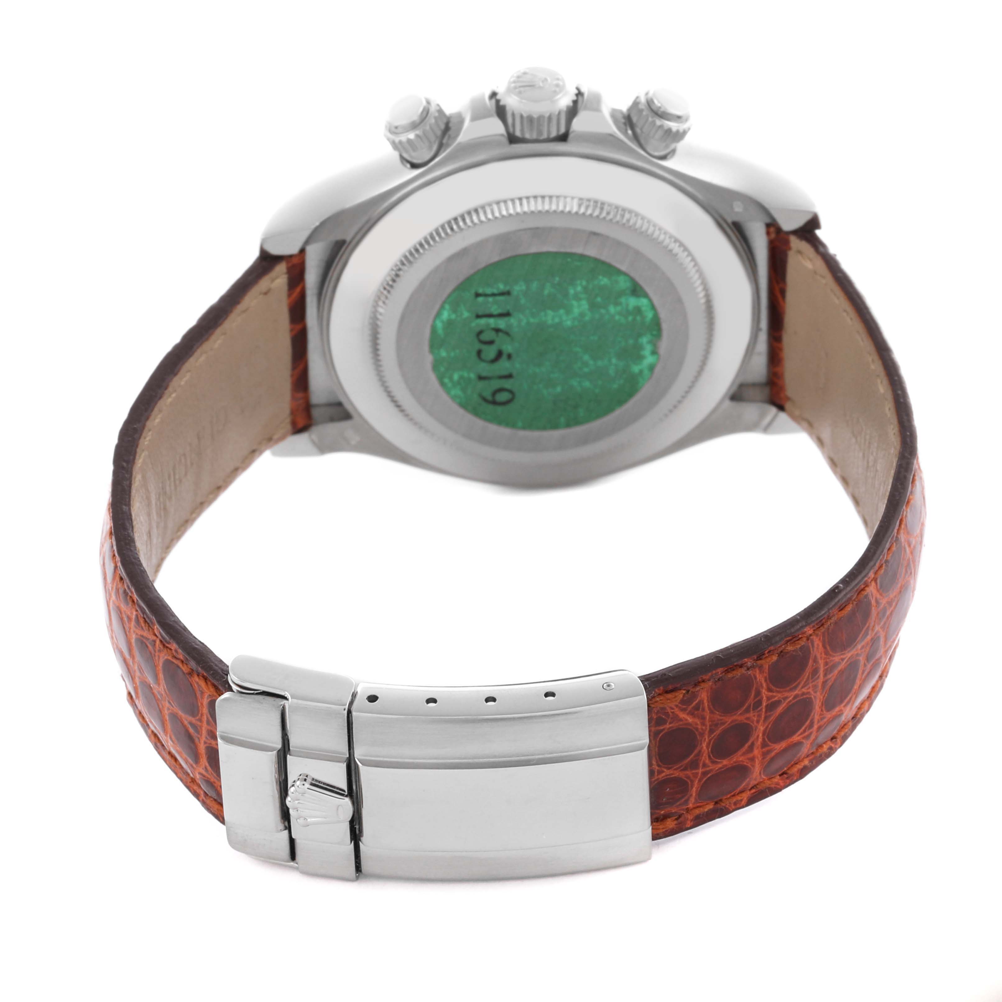 The image shows the back case and clasp of a Rolex Daytona 116519 Men's White Gold White Dial 116519 Men's White Gold White Dial watch, with a brown leather strap visible.