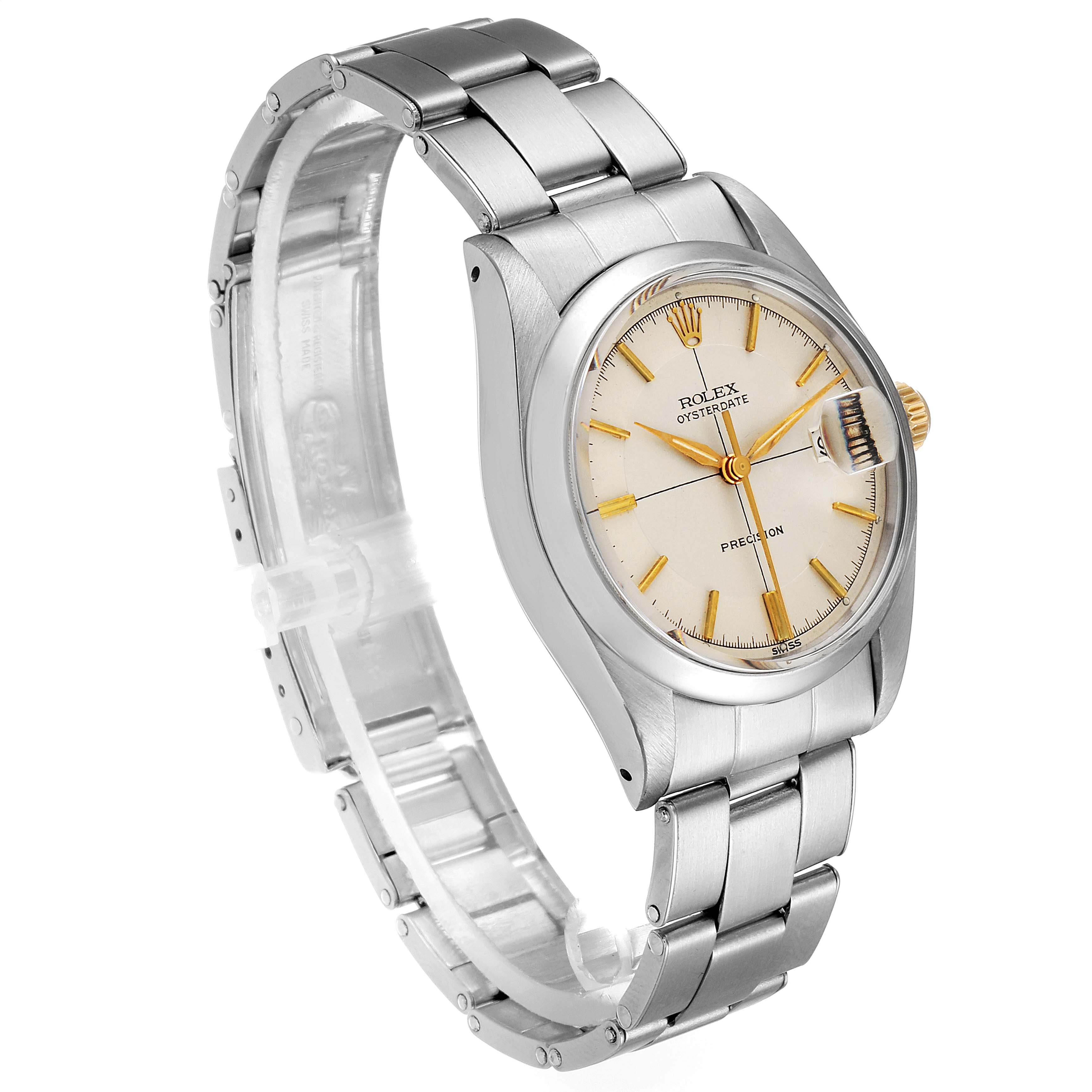 The Vintage Collection Rolex watch is shown from a side angle, displaying the bracelet, dial, and crown.