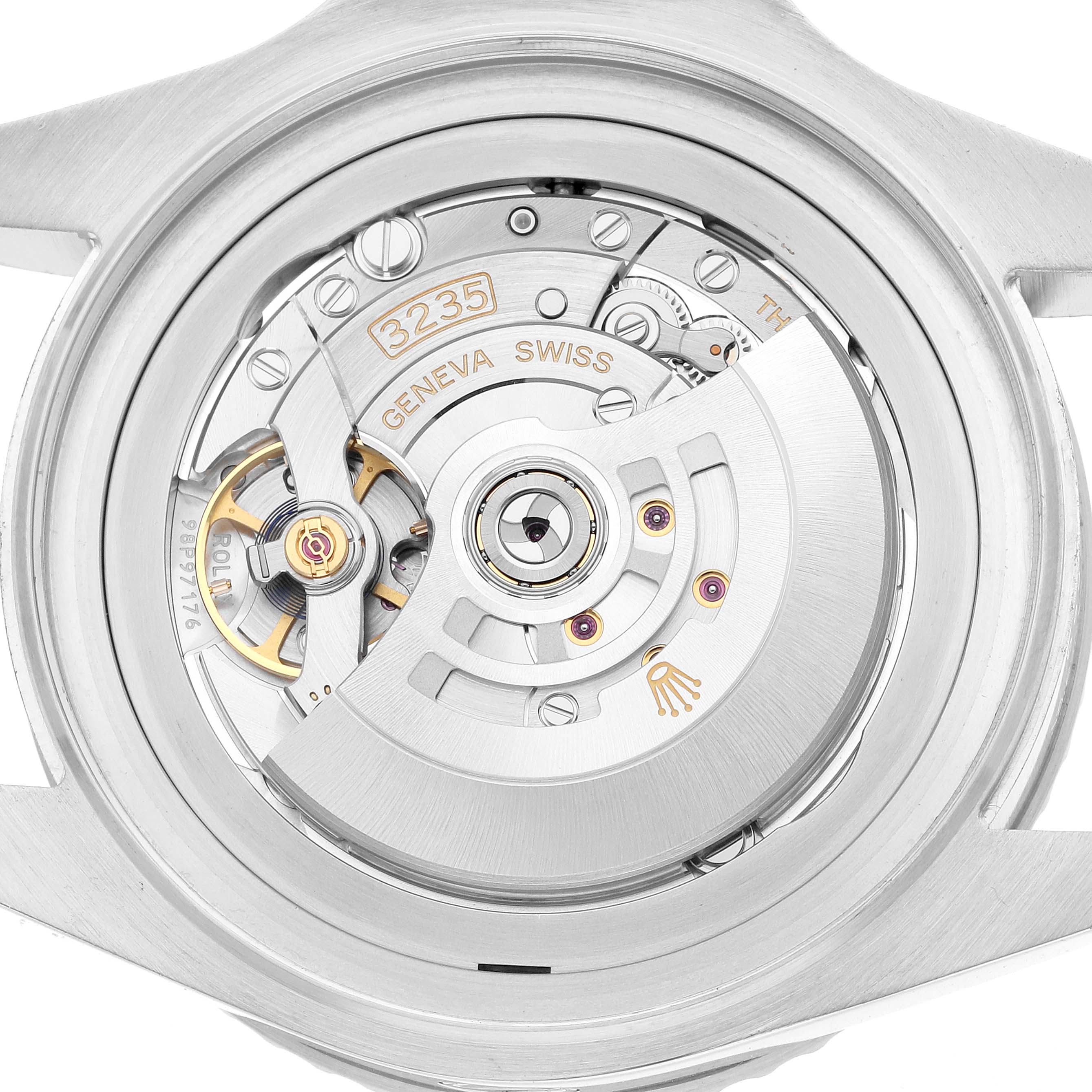 The image shows a close-up of the Rolex Sea-Dweller 126660 Men's Stainless Steel Blue Dial's movement mechanism from the back.