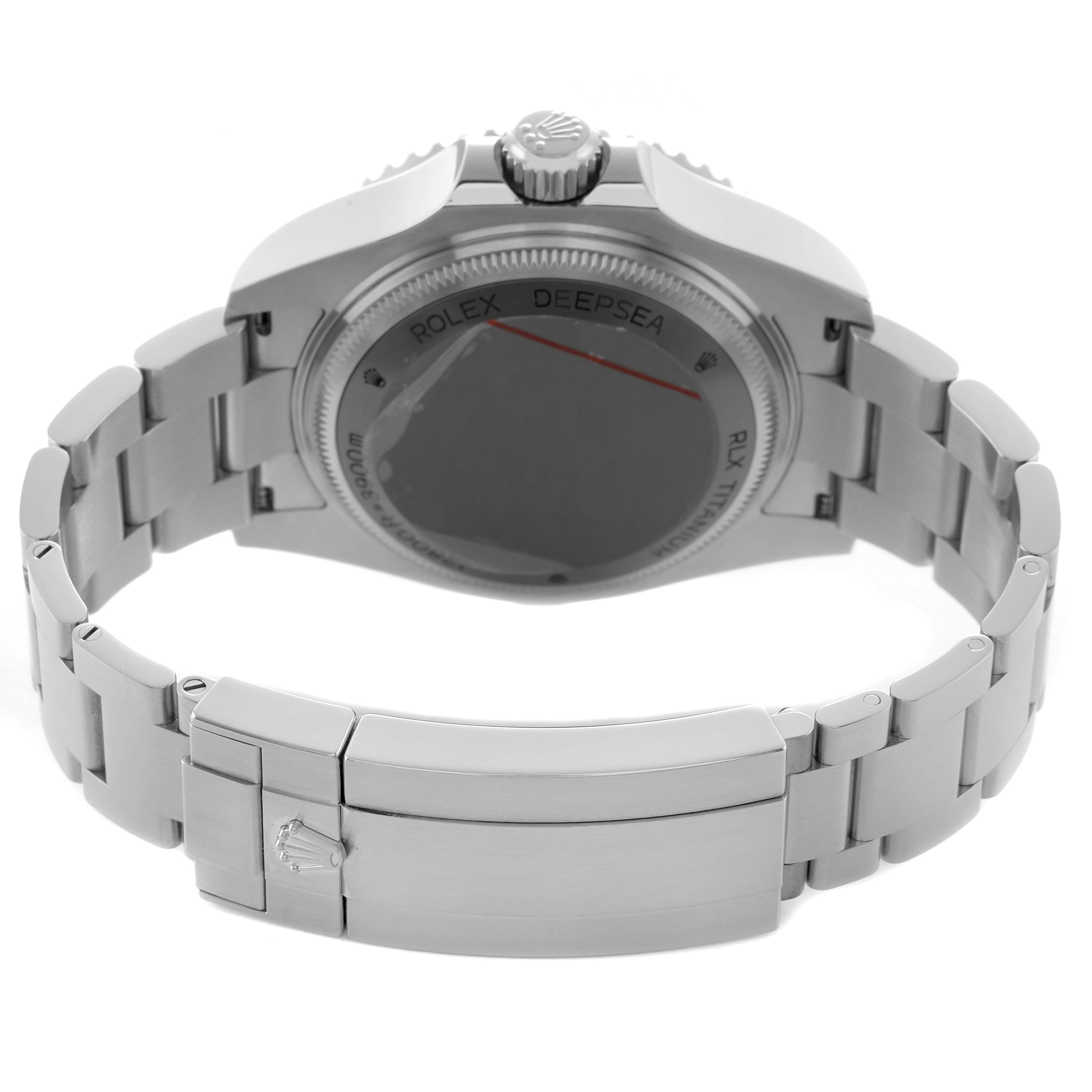 The Rolex Sea-Dweller 136660 Men's Stainless Steel Black Dial watch is shown from the back, highlighting the clasp and bracelet with partial view of the case back.