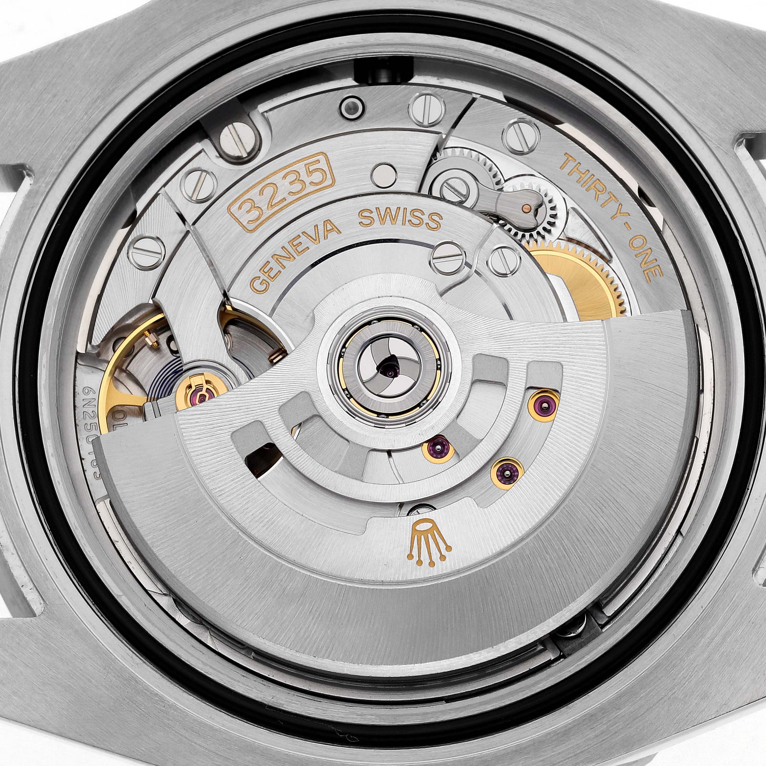 The image shows the movement of a Rolex Submariner 126610LN Men's Stainless Steel Black Dial 126610LN Men's Stainless Steel Black Dial watch, focusing on the intricate mechanical parts.