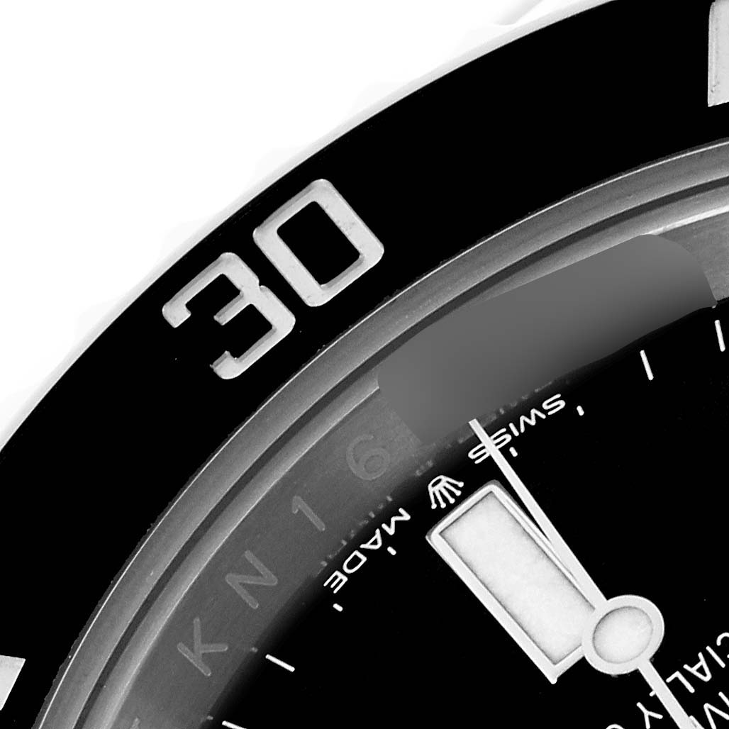The image shows a close-up of the bezel and part of the dial of a Rolex Submariner 126610LN Men's Stainless Steel Black Dial 126610LN Men's Stainless Steel Black Dial watch.