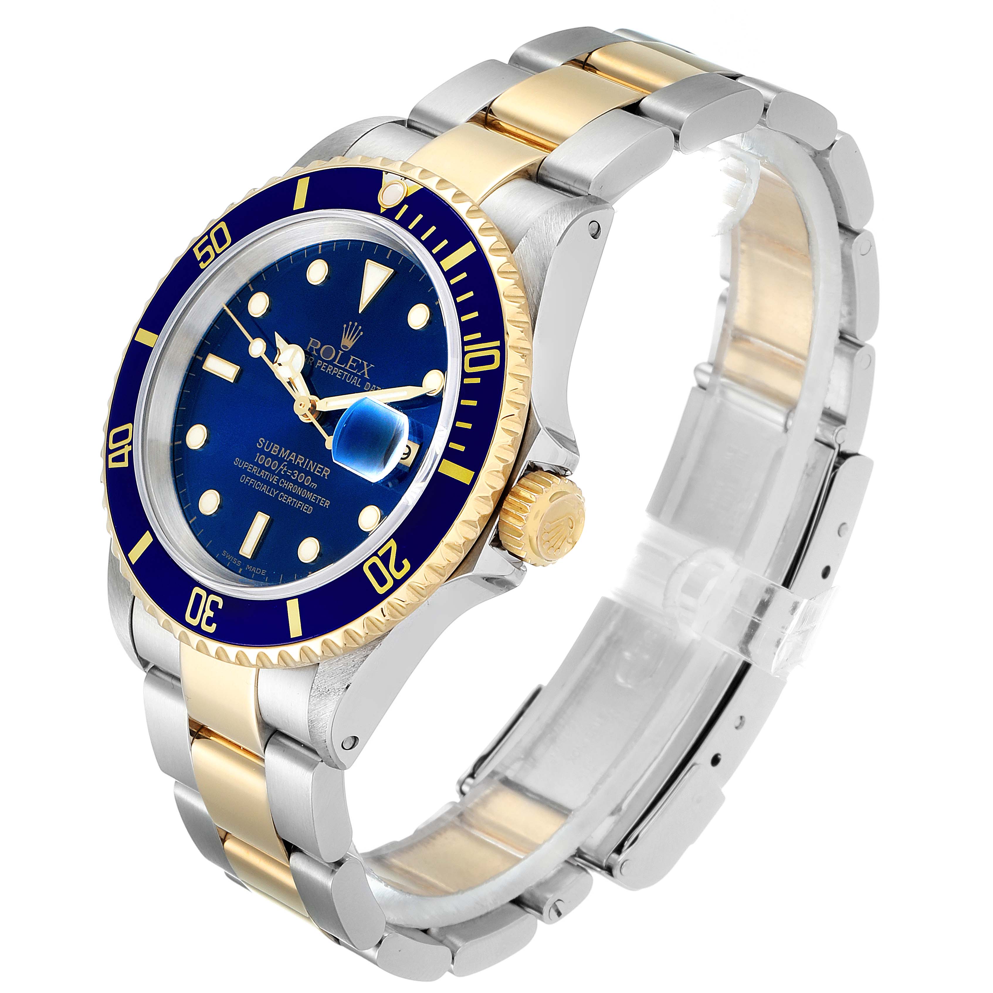 The image shows a Rolex Submariner 16613 Men's Steel and Gold (two tone) Blue Dial 16613 Men's Steel and Gold (two tone) Blue Dial watch at a 3/4 angle, highlighting its blue dial, bezel, and gold-and-silver bracelet.