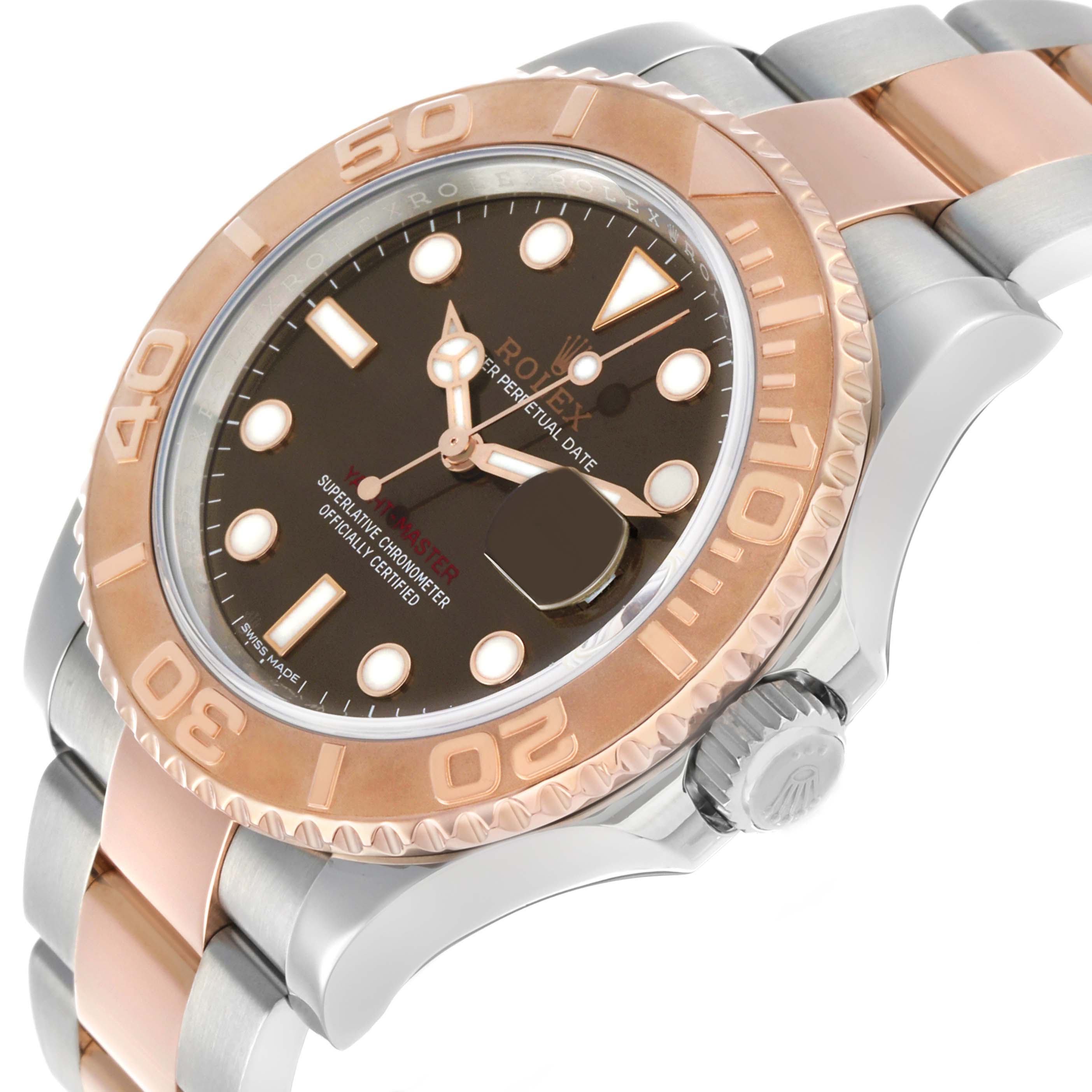 The Rolex Yacht-Master 116621 Men's Steel and Gold (two tone) Brown Dial watch is shown at an angled side view, displaying the bezel, dial, crown, and bracelet.