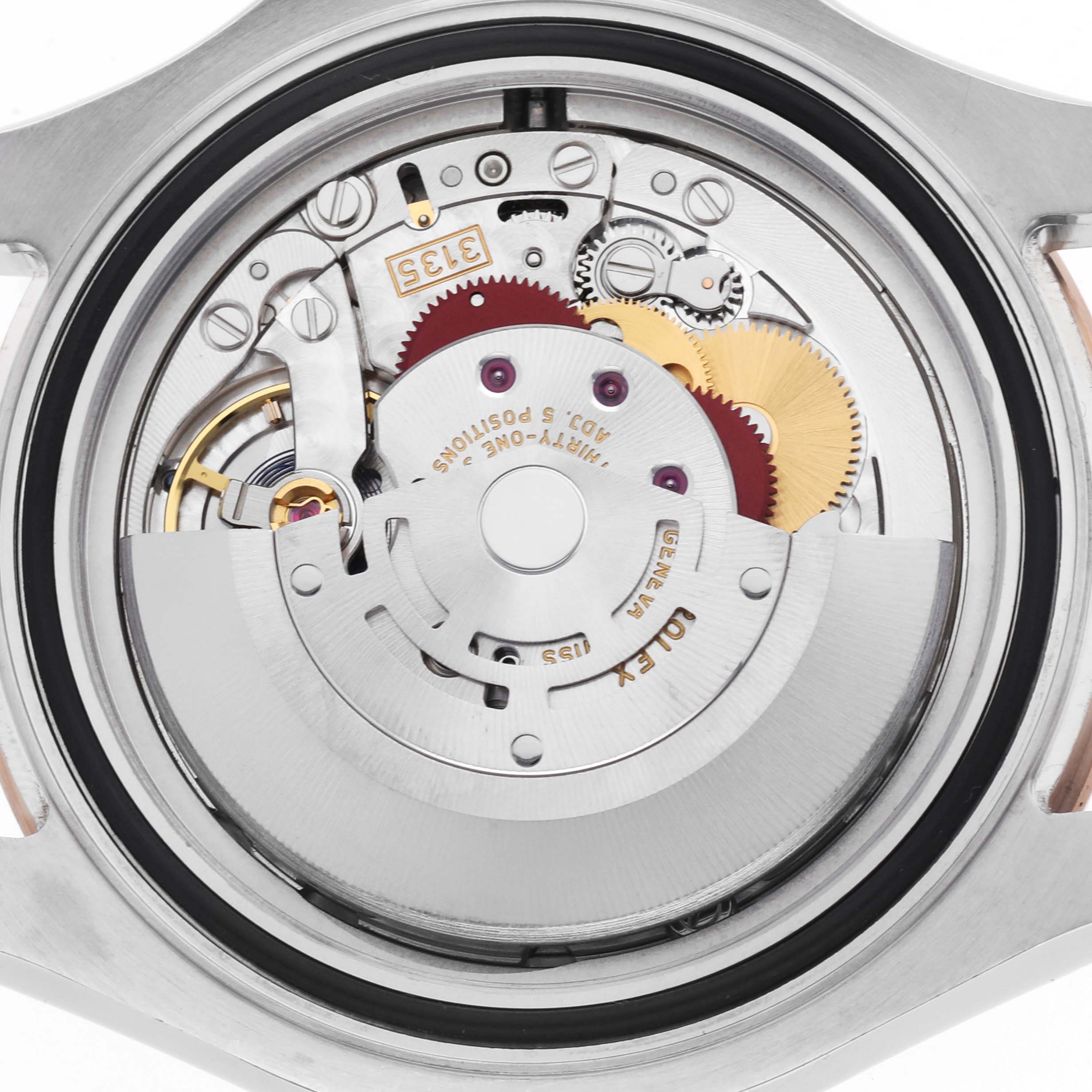The image shows the Rolex Yacht-Master 116621 Men's Steel and Gold (two tone) Brown Dial's movement, viewed from the back, displaying its intricate gears and rotor.