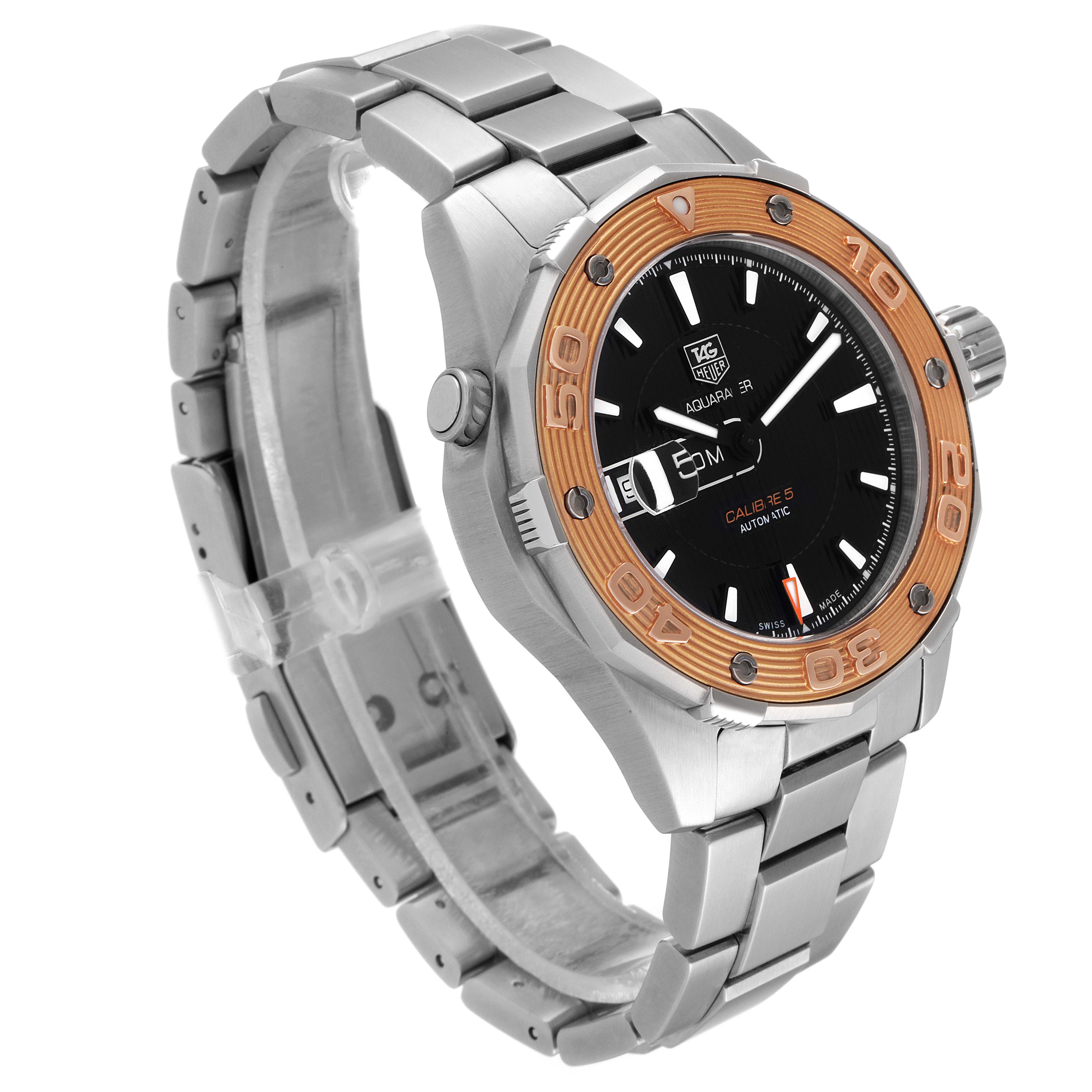 The image shows a side angle of the Tag Heuer Aquaracer WAJ2150.BA0870 Men's Steel and Gold (two tone) Black Dial WAJ2150.BA0870 Men's Steel and Gold (two tone) Black Dial watch, highlighting the bezel, dial, and metal bracelet.