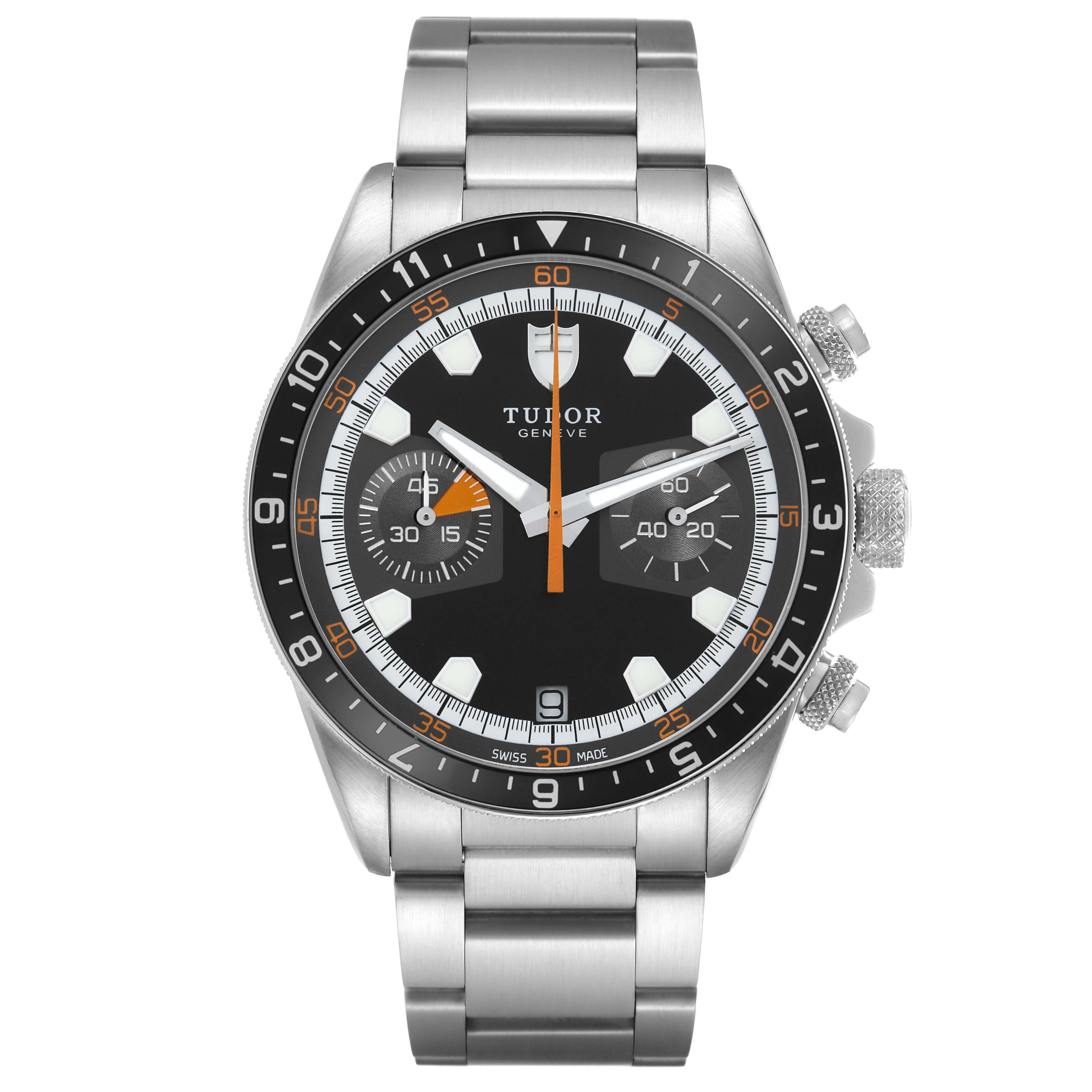 The image shows a front view of the Tudor Heritage Chrono 70330N Men's Stainless Steel Black Dial watch, highlighting its face, bezel, and bracelet.