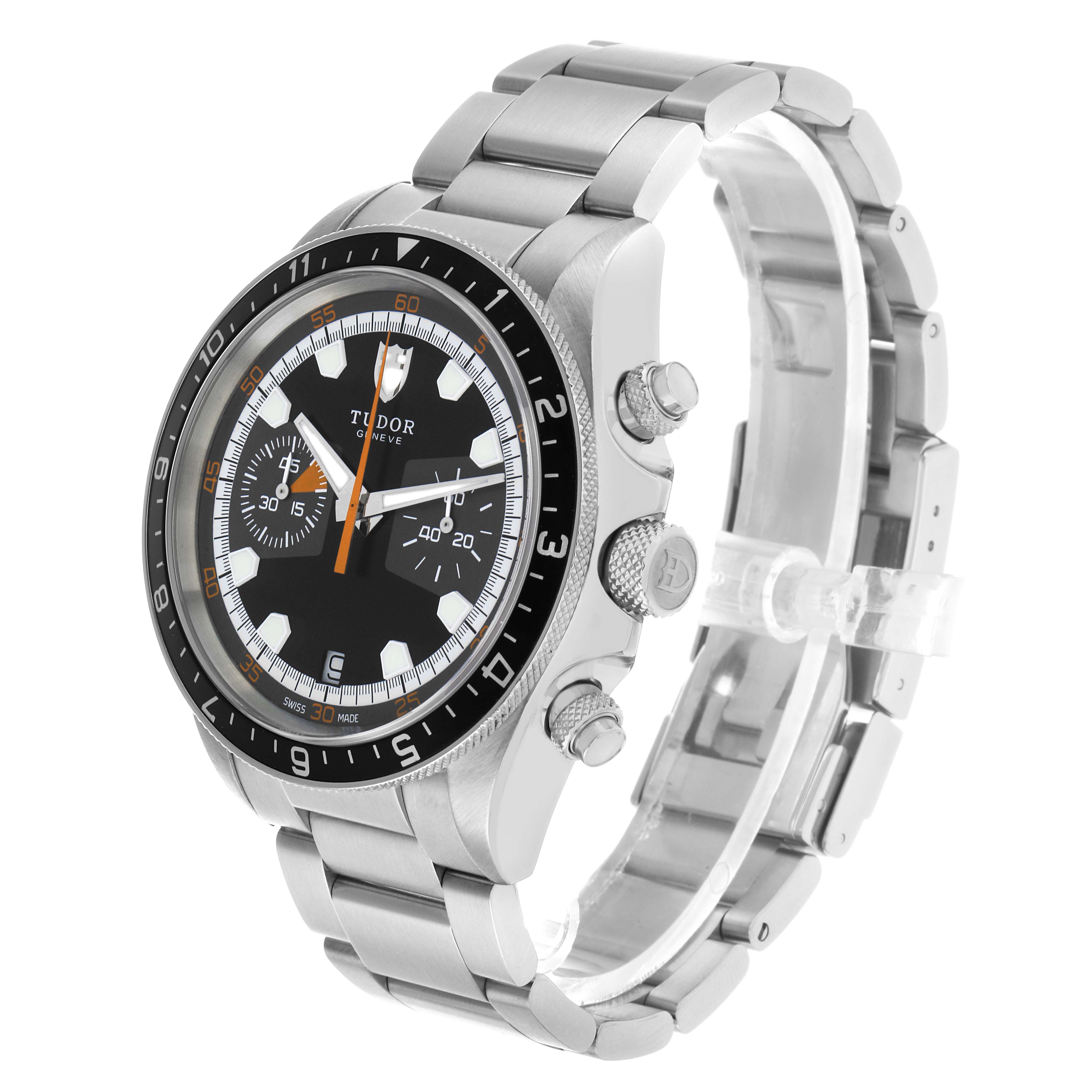 The Tudor Heritage Chrono 70330N Men's Stainless Steel Black Dial watch is shown at a three-quarter angle, highlighting the case, dial, pushers, and bracelet.