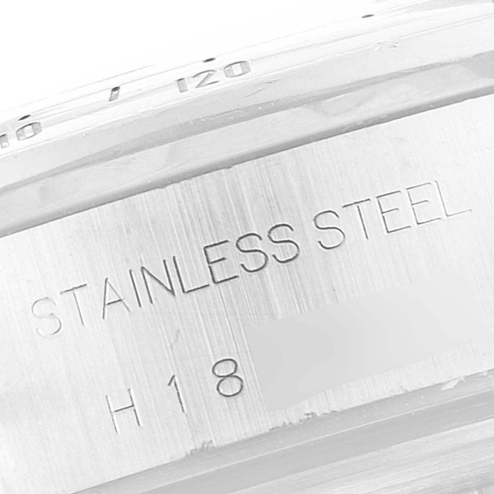 The image shows a close-up of the steel case back of the Tudor Prince model watch, featuring "STAINLESS STEEL" engraving.