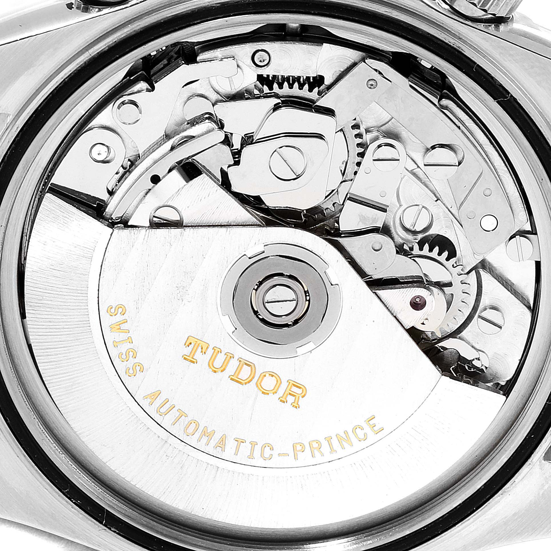 This image shows the internal mechanical parts of a Tudor Prince watch, including the rotor marked "TUDOR SWISS AUTOMATIC-PRINCE."