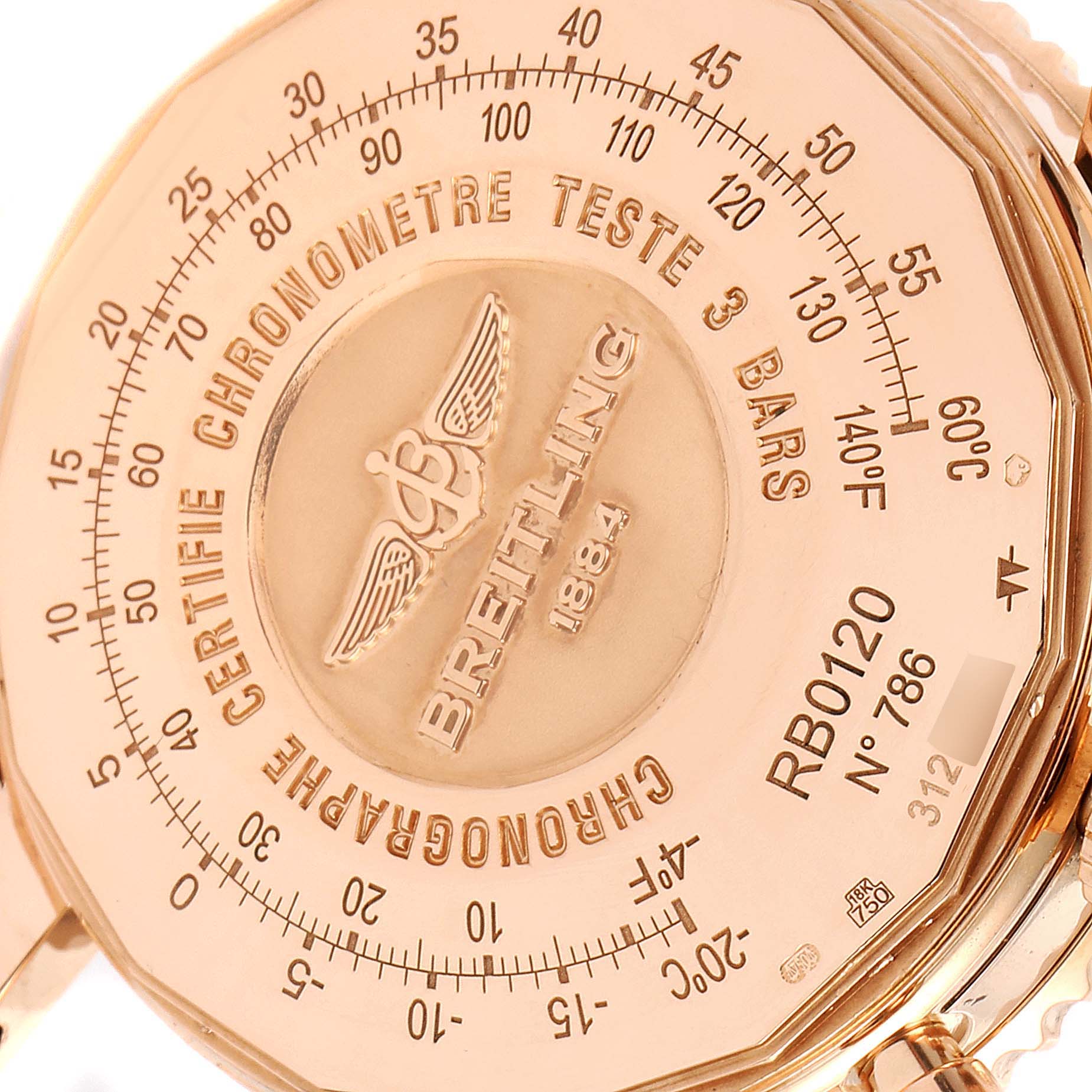 This image shows the back case of a Breitling Navitimer RB0120 Men's Rose Gold Black Dial RB0120 Men's Rose Gold Black Dial watch, including engraved details and scales.