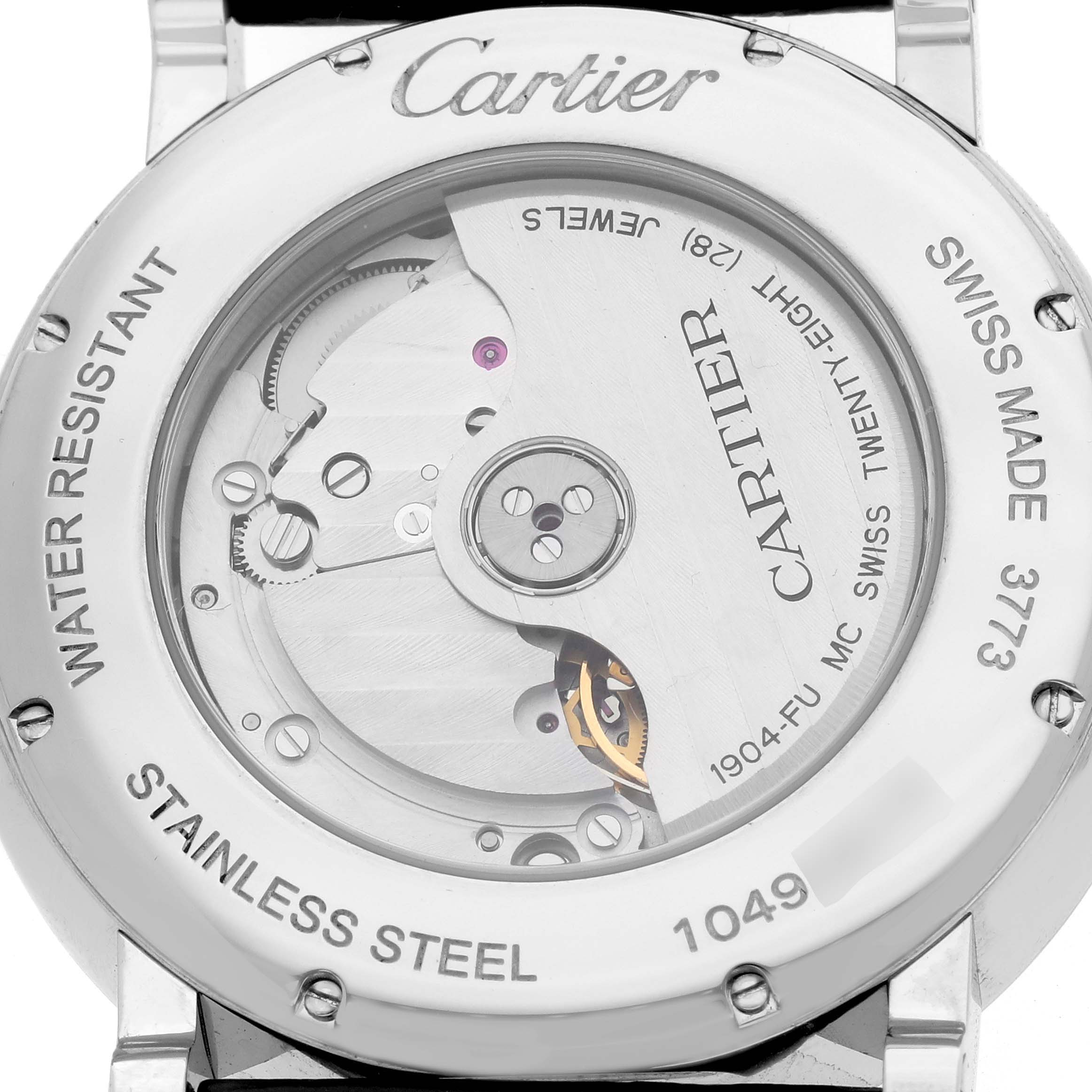 The image shows the back of a Cartier Rotonde W1556368 Men's Stainless Steel Silver Dial watch, highlighting its movement and "Cartier" branding.