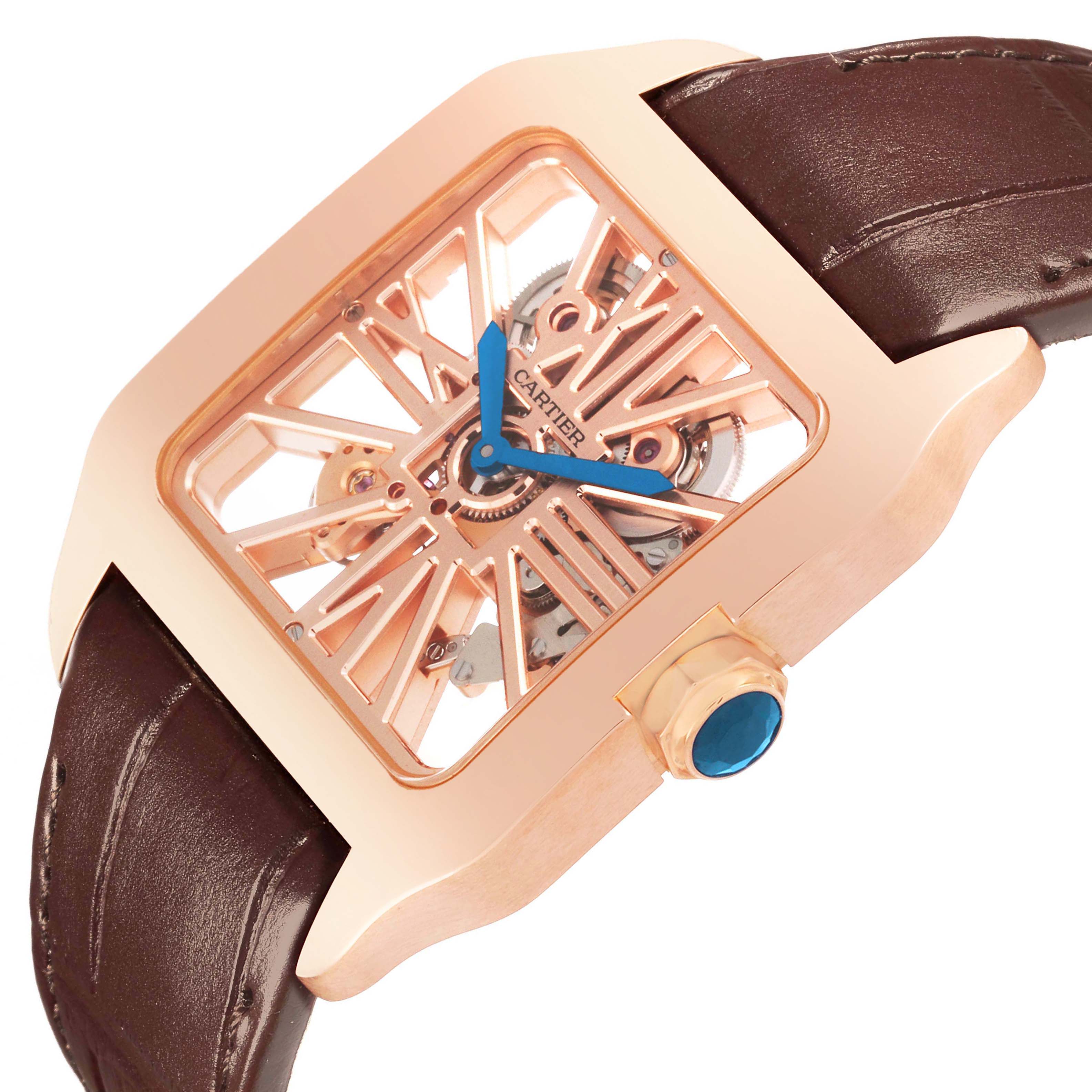 The Cartier Santos 65759 Men's Rose Gold Transparent Dial 65759 Men's Rose Gold Transparent Dial watch is shown at an angled view, highlighting the skeleton dial, crown, and brown leather strap.