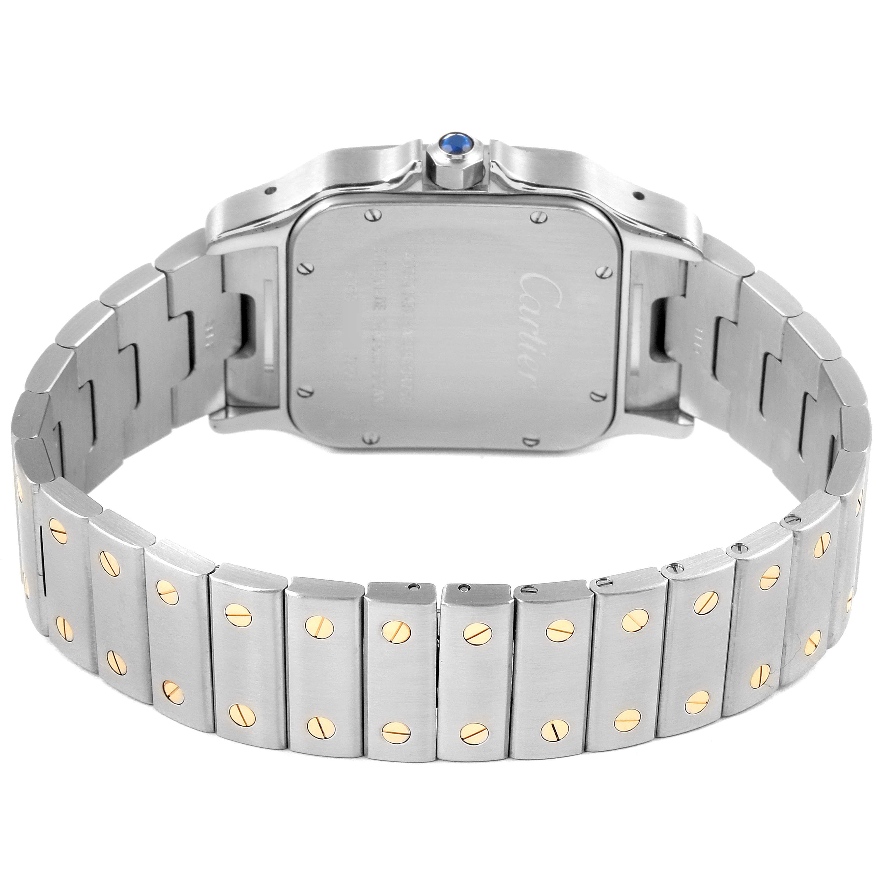 This image shows the back panel and bracelet of a Cartier Santos W20099C4 Men's Steel and Gold (two tone) Silver Dial W20099C4 Men's Steel and Gold (two tone) Silver Dial watch, highlighting the clasp and links.